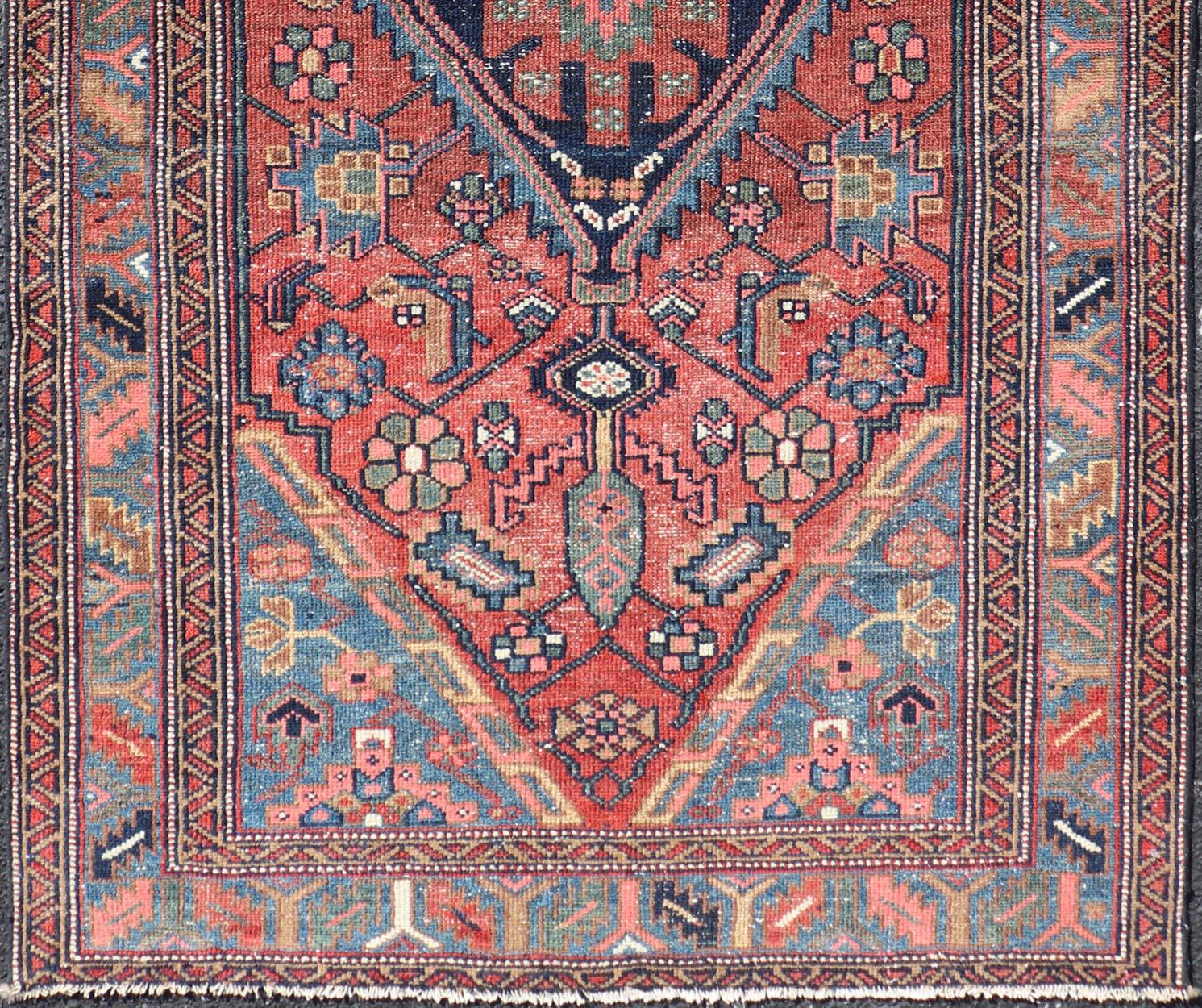 Malayer Antique Persian Hamadan Rug with Colorful Geometric Medallion on Red Background For Sale