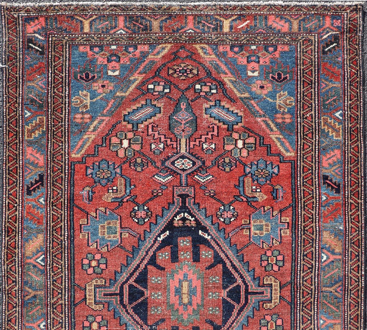 Hand-Knotted Antique Persian Hamadan Rug with Colorful Geometric Medallion on Red Background For Sale