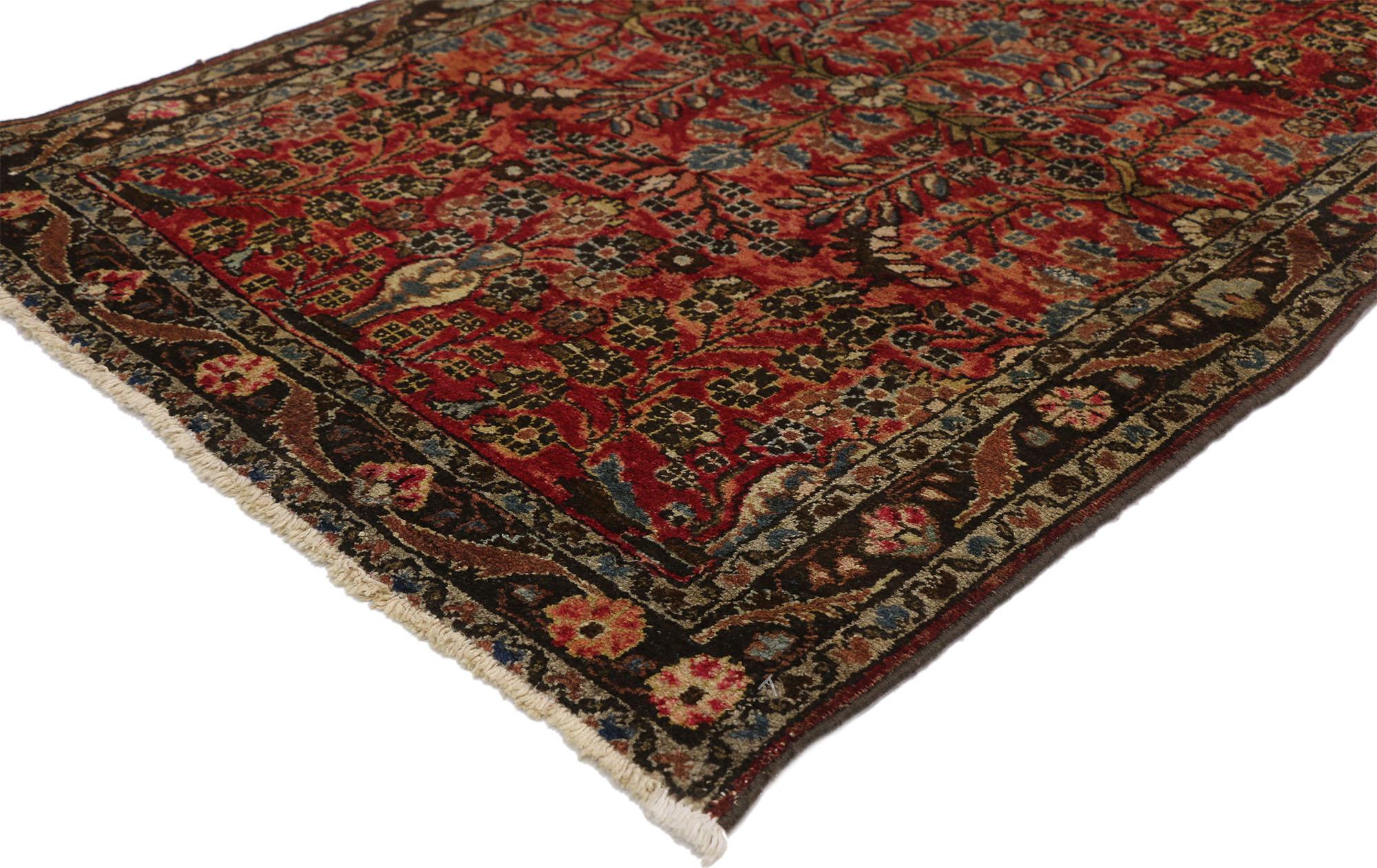 72334, antique Persian Hamadan rug with floral vase Motif and Traditional style. Poised to impress, this hand knotted wool antique Persian Hamadan rug features a Sarouk inspired floral design. At either end of the rug are urn shaped vases with