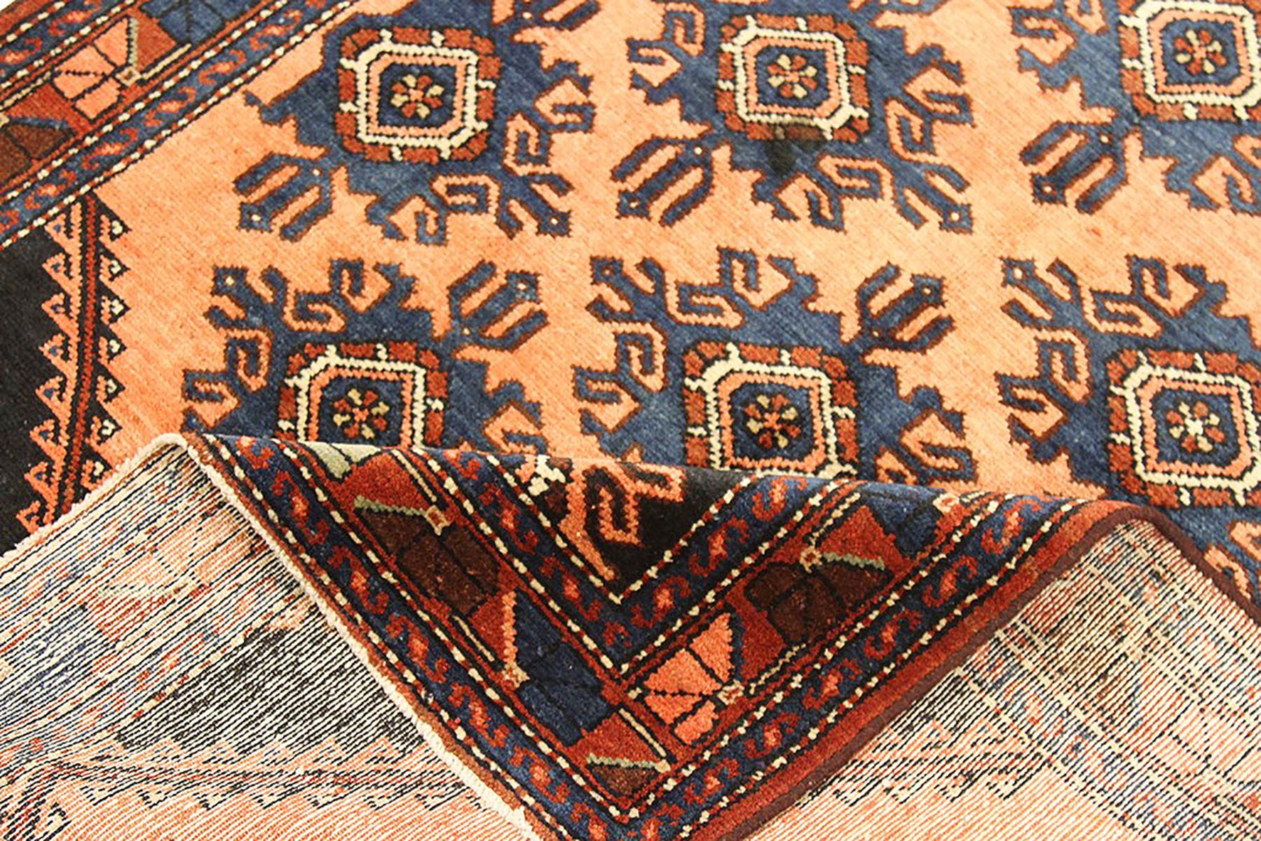 Islamic Antique Persian Hamadan Rug with Navy and Brown Floral Details on Black Field For Sale