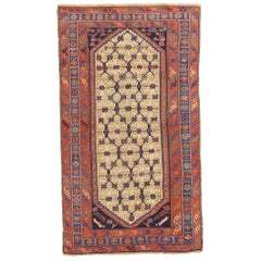Antique Persian Hamadan Rug with Navy and Red Floral Details on Beige Field