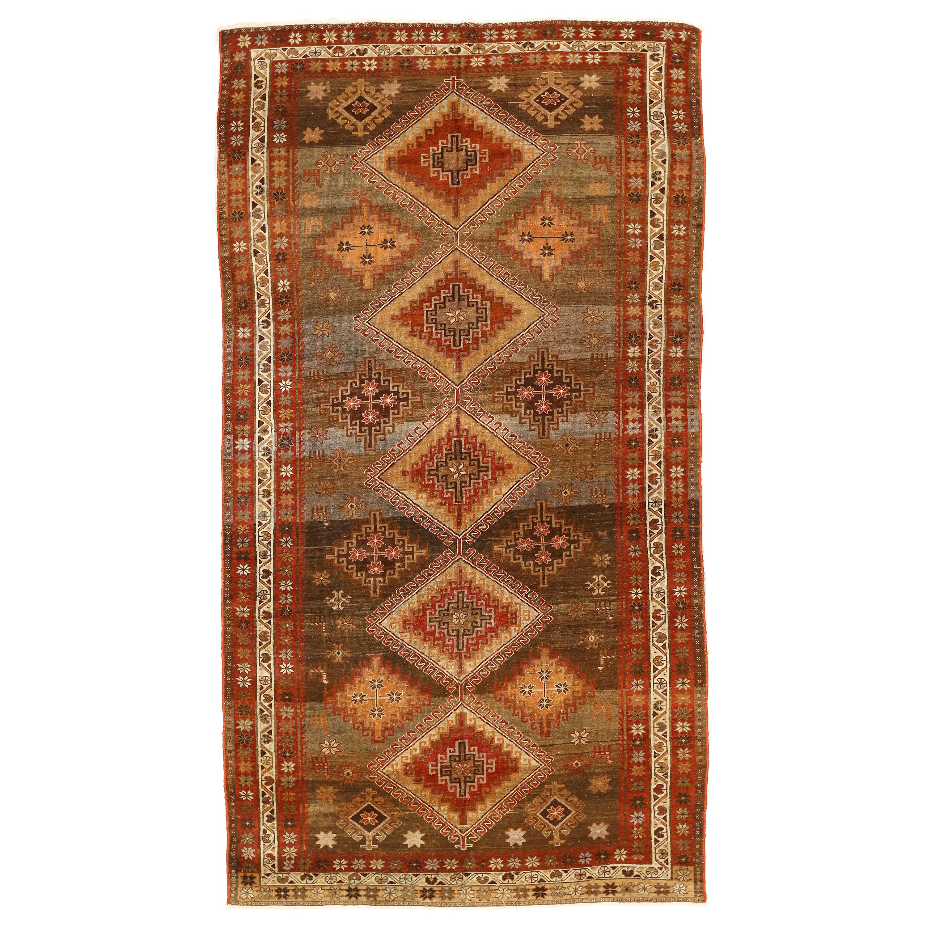 Antique Persian Hamadan Rug with Red and Brown Tribal Details For Sale