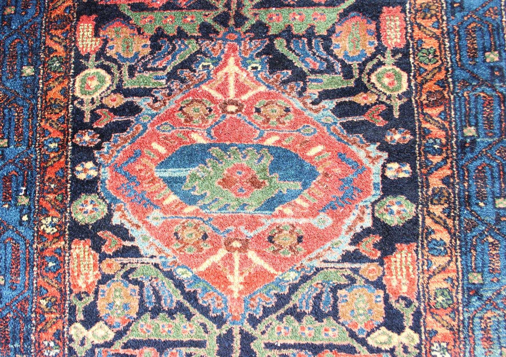 Measures: 3'4 x 6'4 
Antique Persian Hamadan Rug with Vibrant Geometric Floral Motifs 3'4 x 6'4. Keivan Woven Arts/ rug/R20-0812, country of origin / type: Iran / Hamadan, circa 1920.
This antique Persian Hamadan rug is a vibrant and dynamic