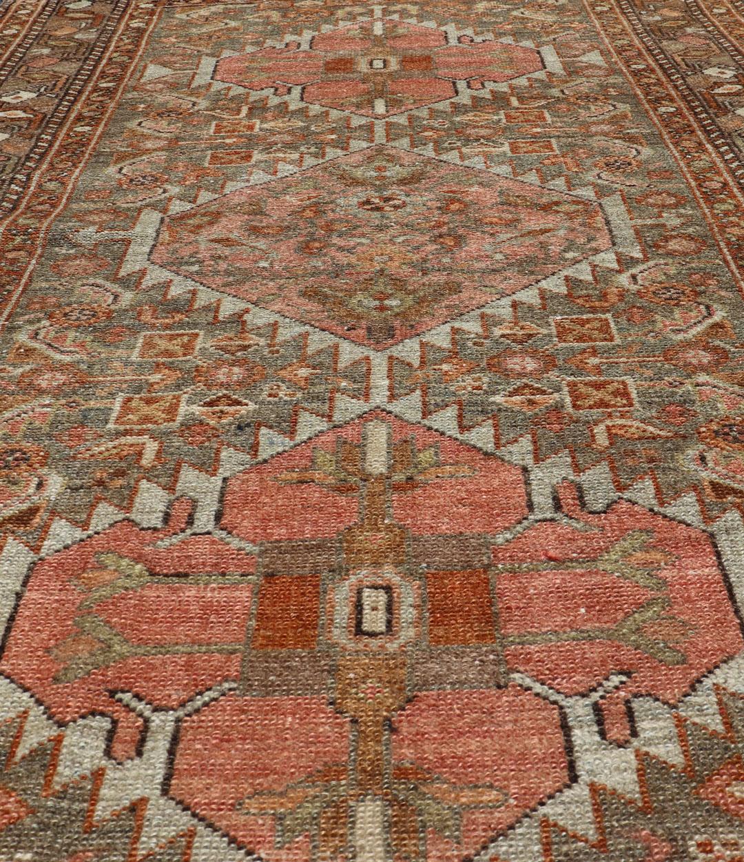 20th Century Antique Persian Hamedan in Rustic Earthy Tones With Tribal Medallions For Sale