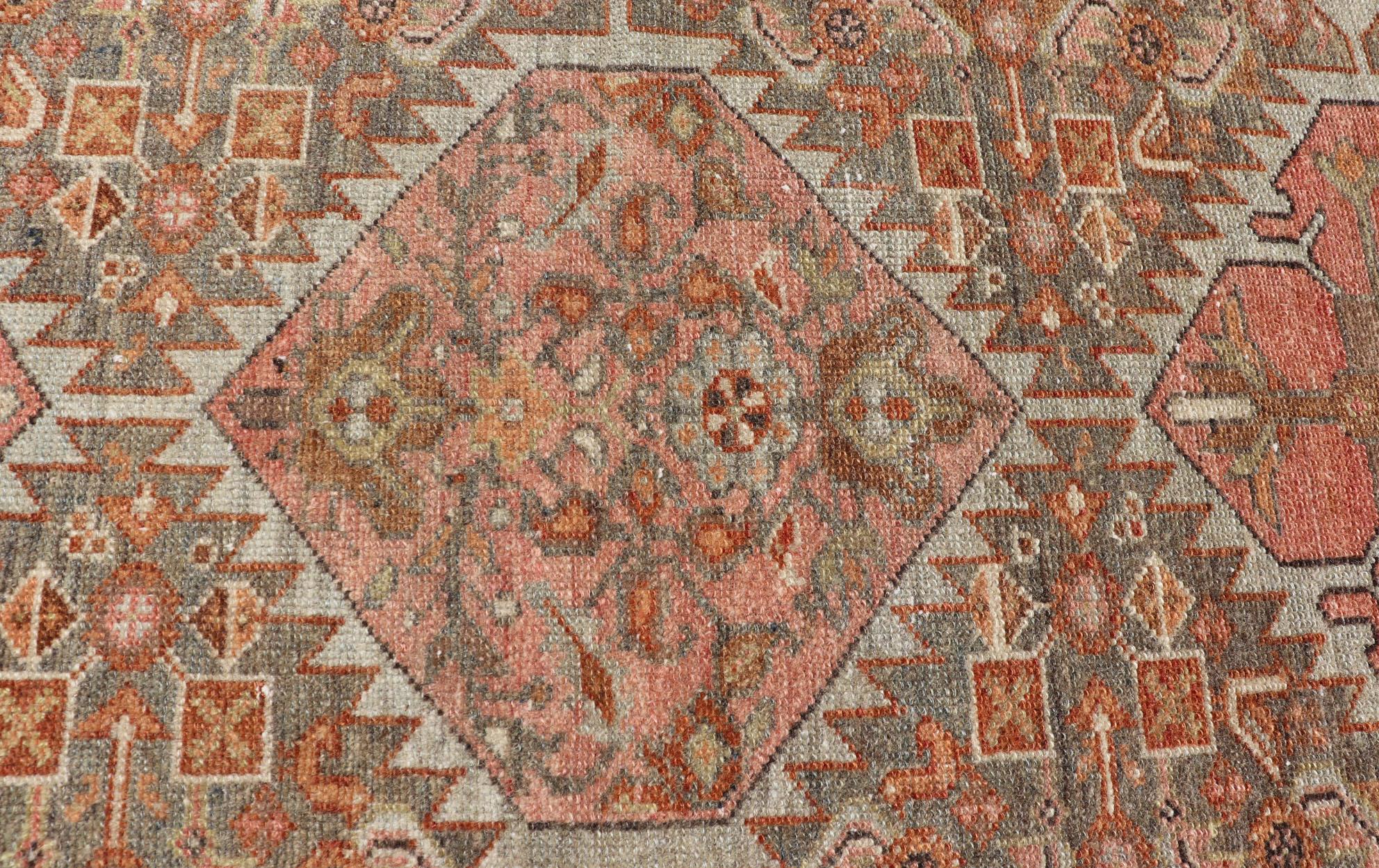 Wool Antique Persian Hamedan in Rustic Earthy Tones With Tribal Medallions For Sale