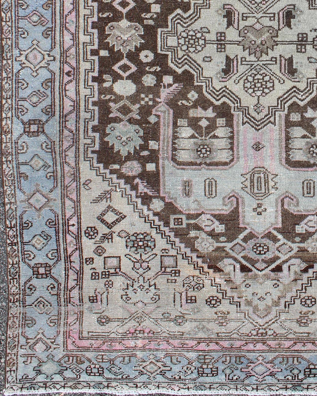Antique Hamadan rug with geometric medallion in blue, pink, chocolate, Keivan Woven Arts / rug 17-0702, country of origin /  Hamadan, circa 1930.

This magnificent Hamadan features beautiful coloration, including tones of ice blue, light pink, and