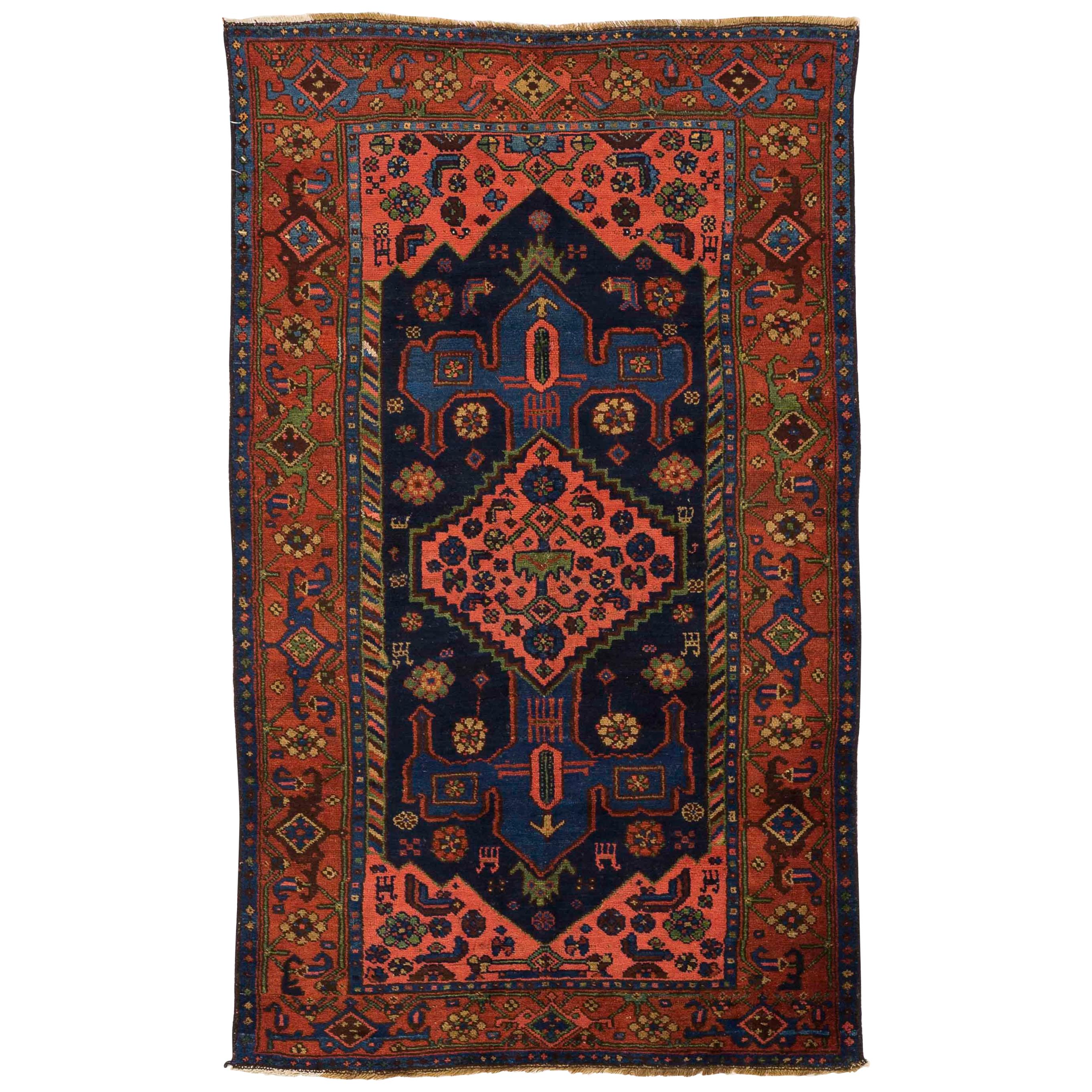 Antique Persian Hamedan Rug with Red and Blue ‘Anchor’ Patterns on Center Field For Sale