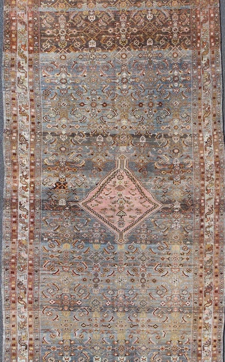 Tribal Antique Persian Hamedan Runner with All-Over Sub-Geometric Medallion Design For Sale