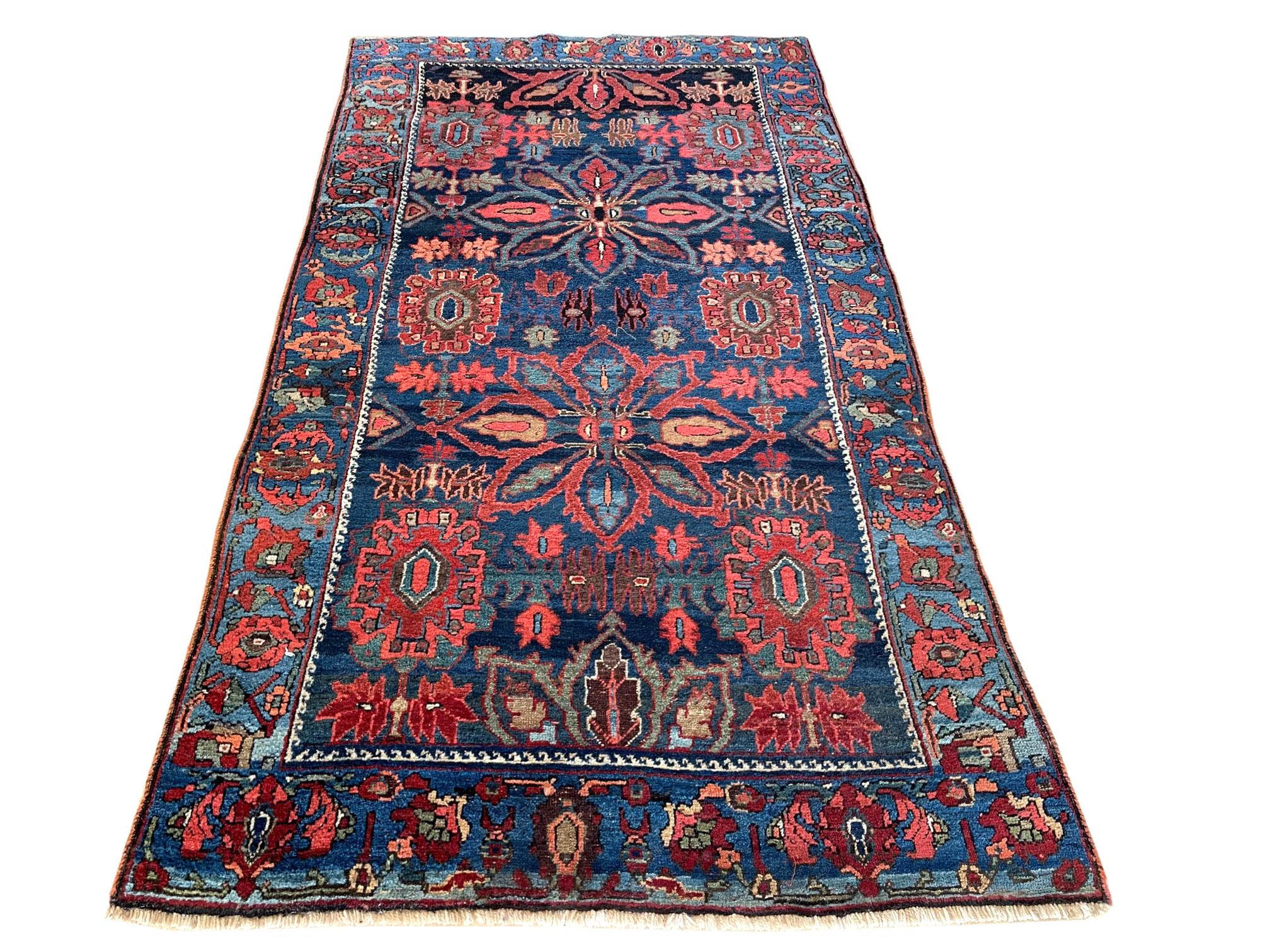 This piece is an antique handmade Persian Bijar rug 1920's circa. Persian Bijar rugs are among the most hardwearing rug. It is made using high-quality wool, and the knots are beaten down using a heavy metal comb to give a tight, dirt-resistant pile.