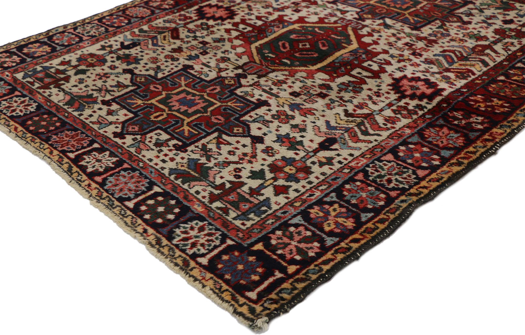 73300 Antique Persian Heriz Karaja Rug with Mid-Century Modern Style, Accent Rug 03'08 x 04'06. This hand-knotted wool antique Persian Heriz Karaja rug features three amulet medallions and a densely populated field with a dazzling array of patterns