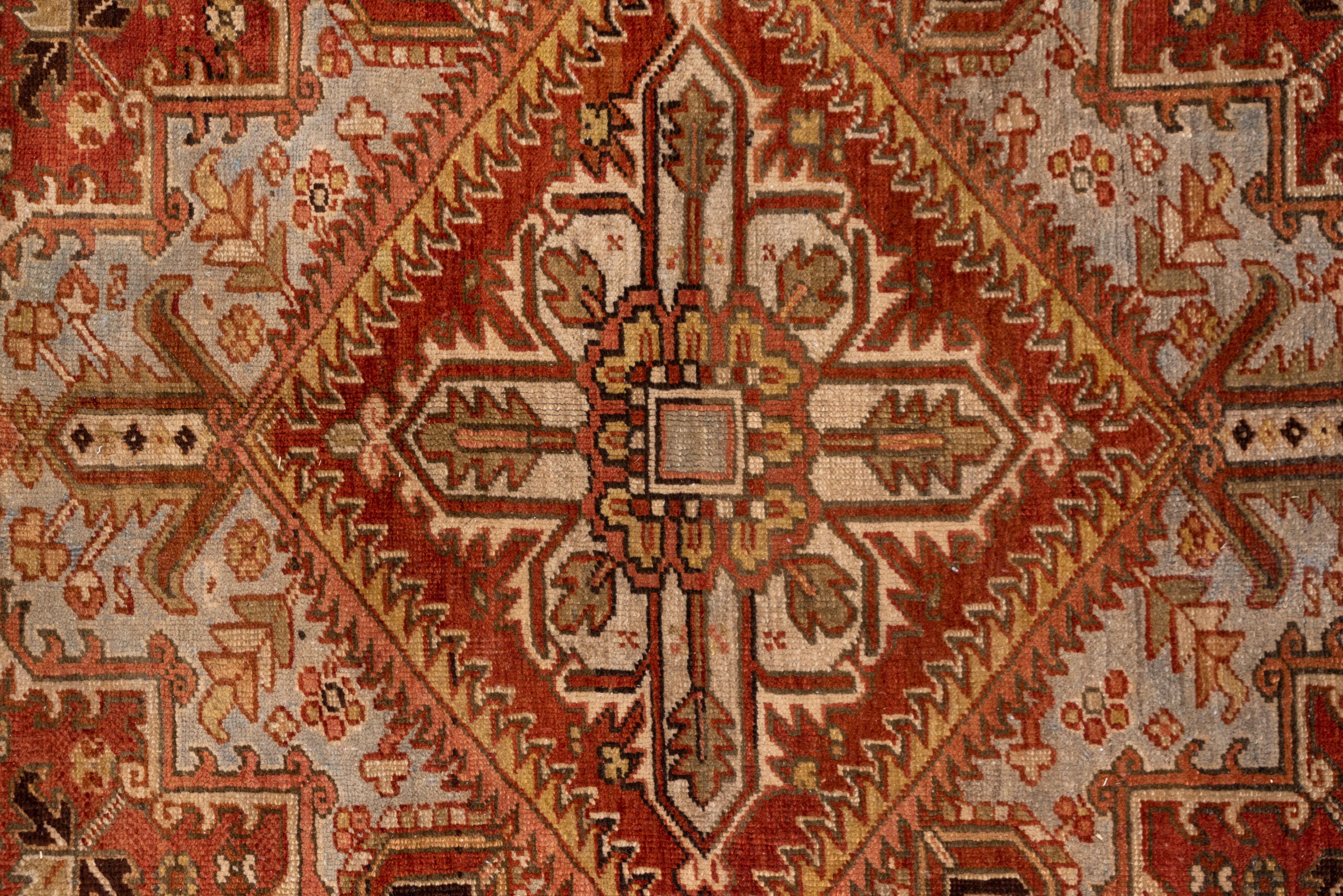 Mid-20th Century Antique Persian Heriz Area Rug with Warm Tones, Circa 1930s For Sale