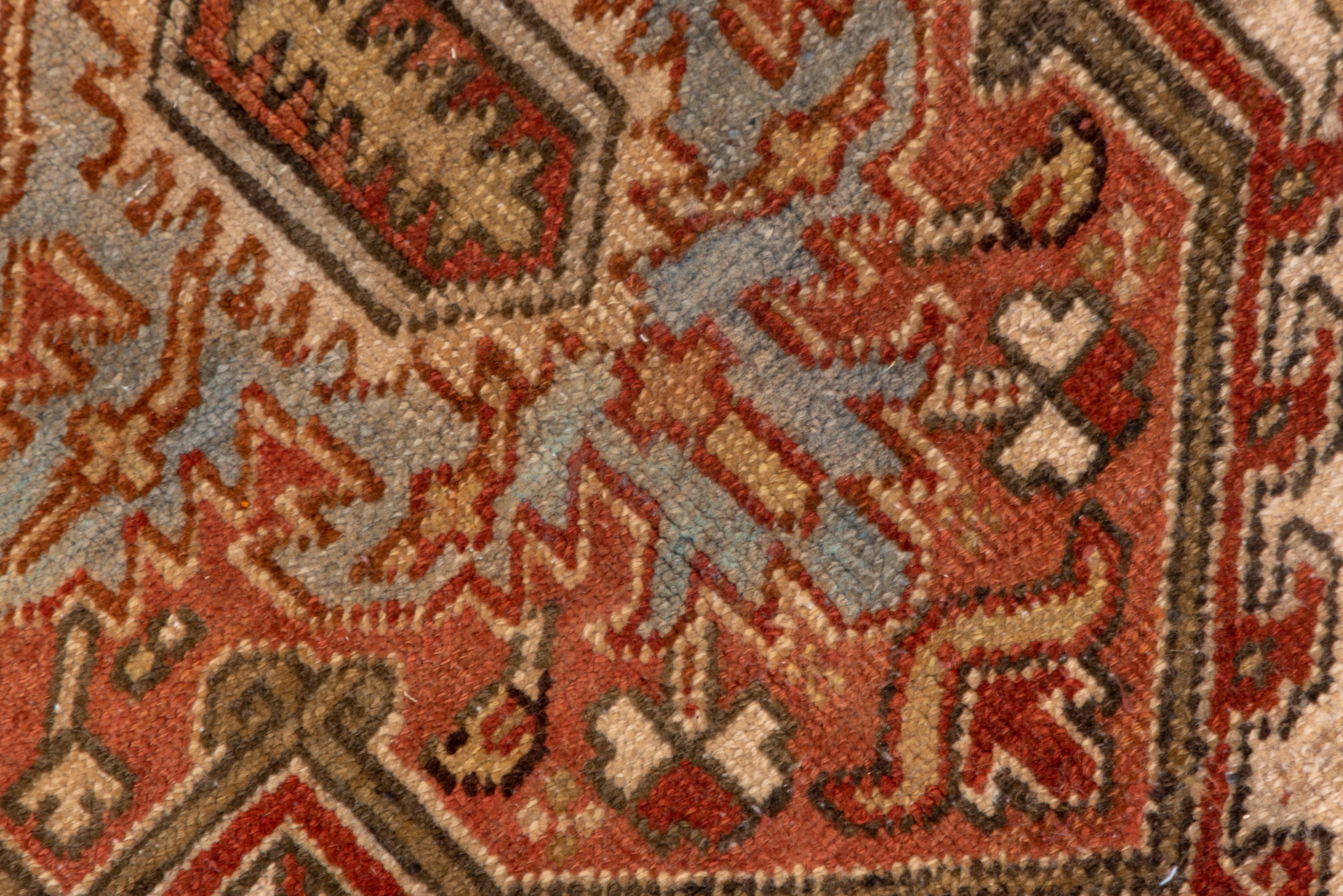 Wool Antique Persian Heriz Area Rug with Warm Tones, Circa 1930s For Sale