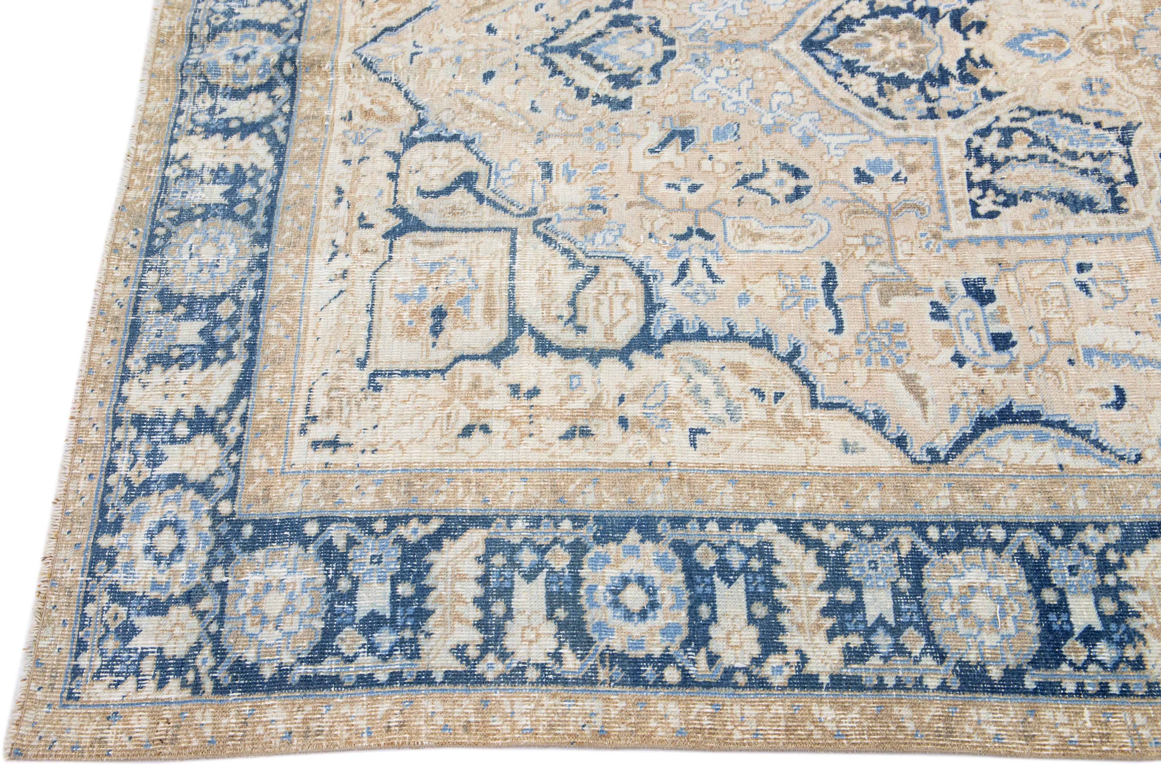 Early 20th Century Antique Persian Heriz Beige Handmade Wool Rug with Medallion Design For Sale