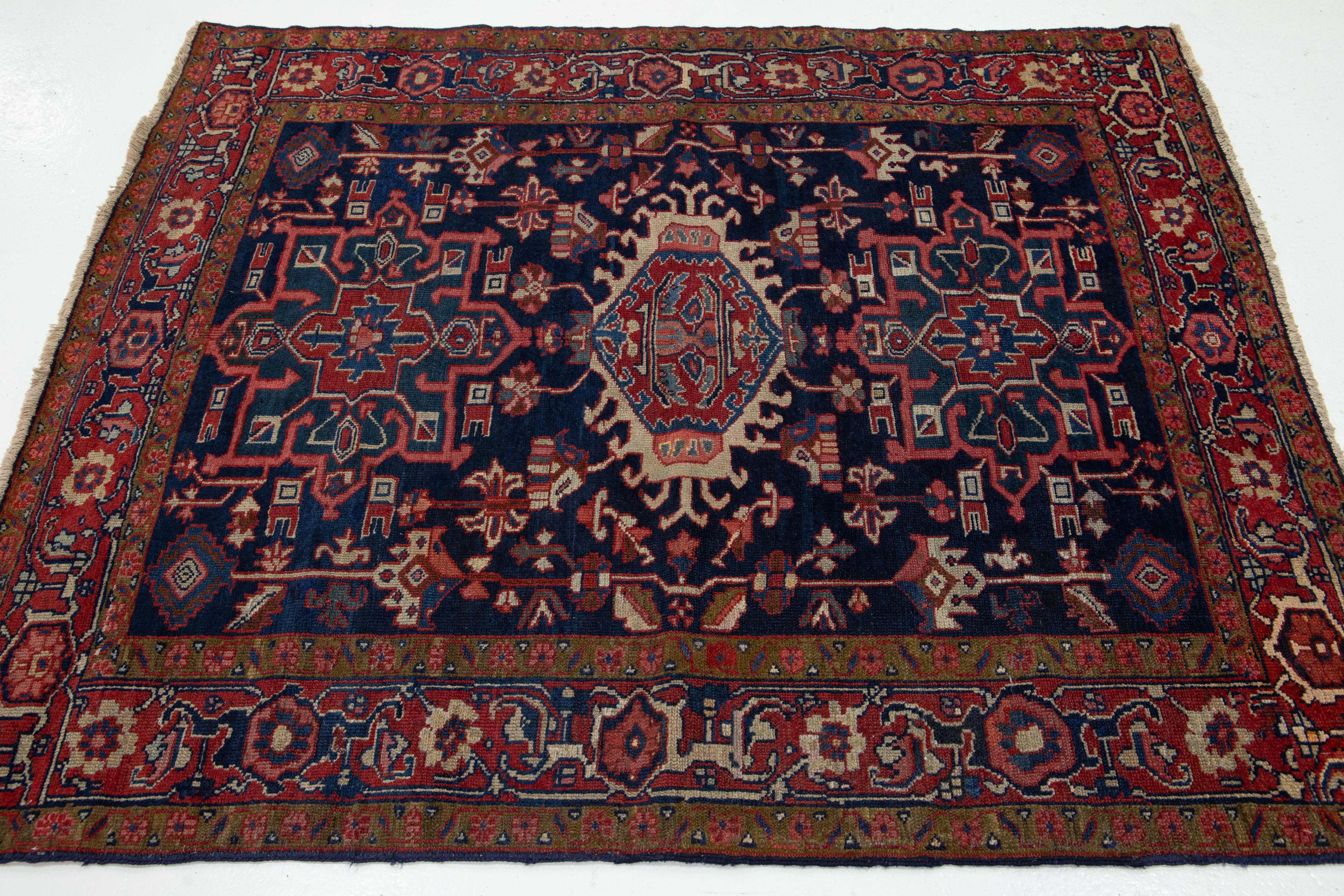 20th Century Antique Persian Heriz Blue Wool Rug Handmade With Medallion Design For Sale