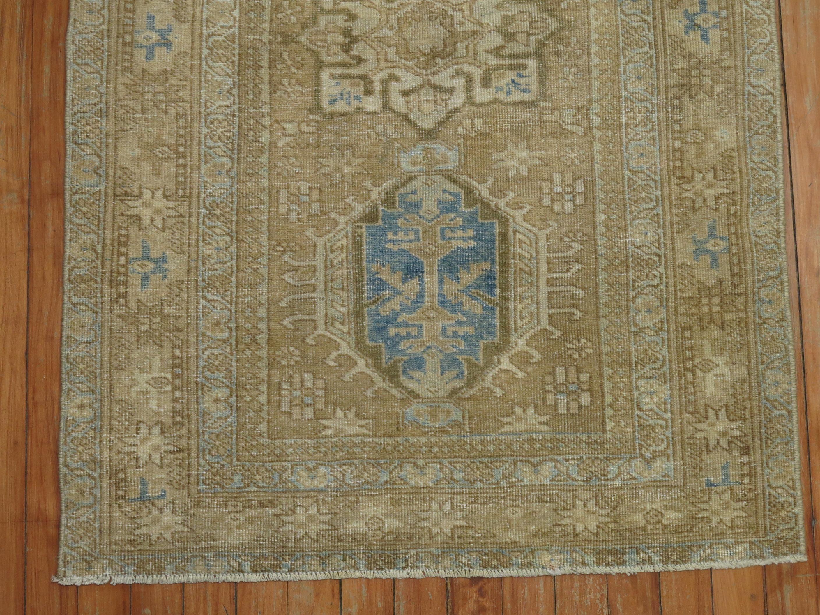 Casual best describe this one of a kind antique Persian Heriz scatter rug.