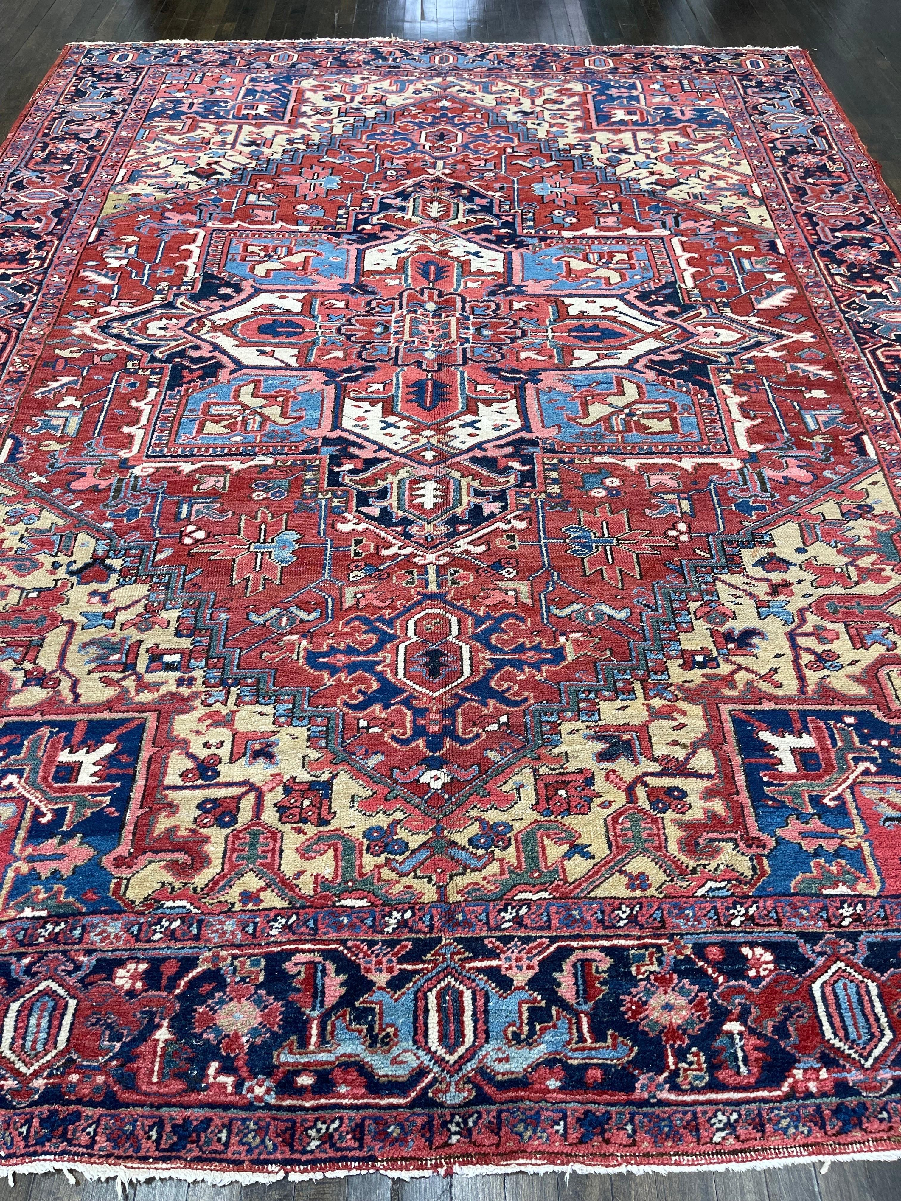 A handsome persian antique Heriz rug featuring a rust brick terracotta field and a very unique mustard color on its four corners. Heriz rugs are known to be very durable,dyes used to make them all natural and wool is handspun.This rug is decorated