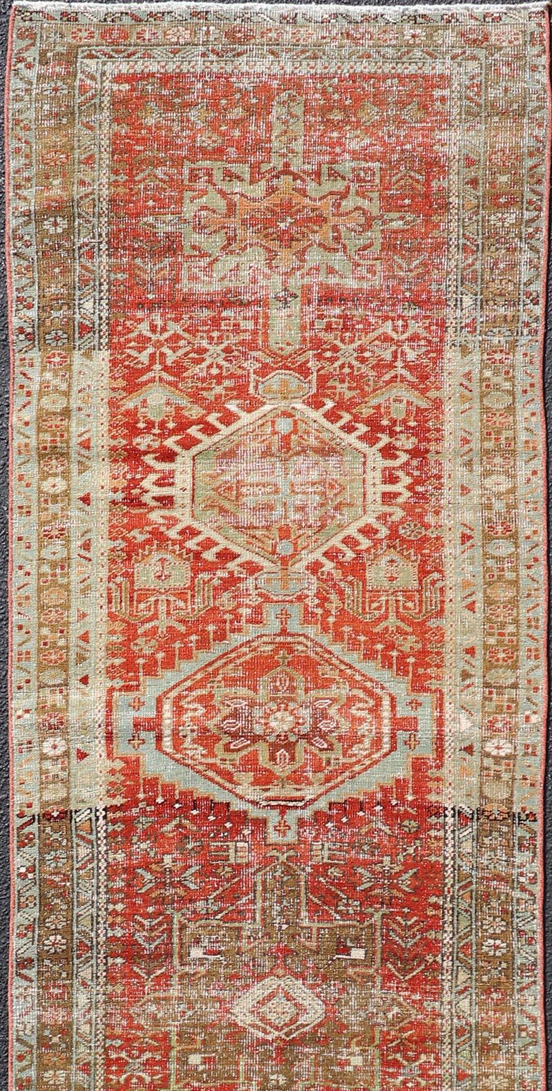 Heriz Serapi Antique Persian Heriz Distressed Runner with Geometric Medallions in Soft Colors For Sale