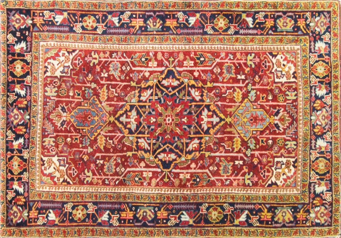 Antique Heriz rugs, made in Northwest Persia or province of Azerbaijan in several dozen towns and villages in the area and they made by these Azeri-Turkish groups through the 20th century. Turkic nomads have produced fine carpets for export and