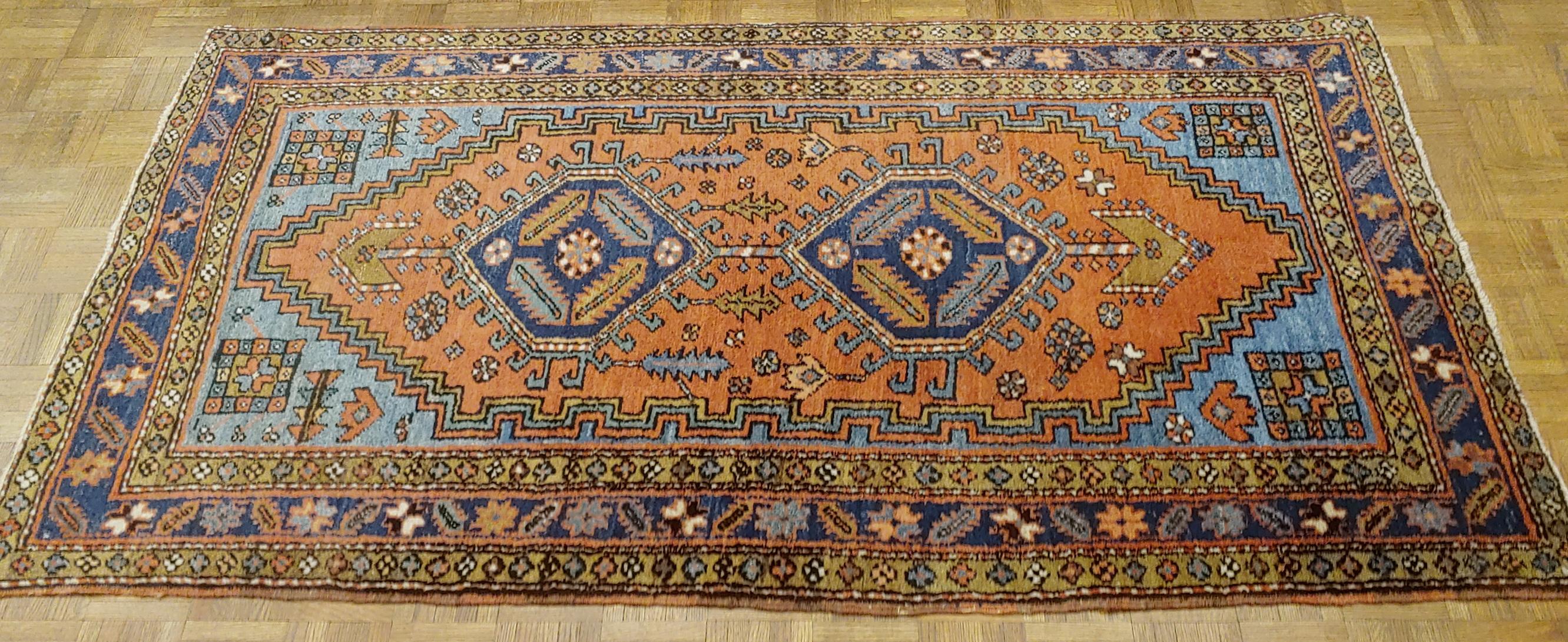 Woven Antique Persian Heriz, Geometric Design, Rust with Blue Wool, 1915 For Sale