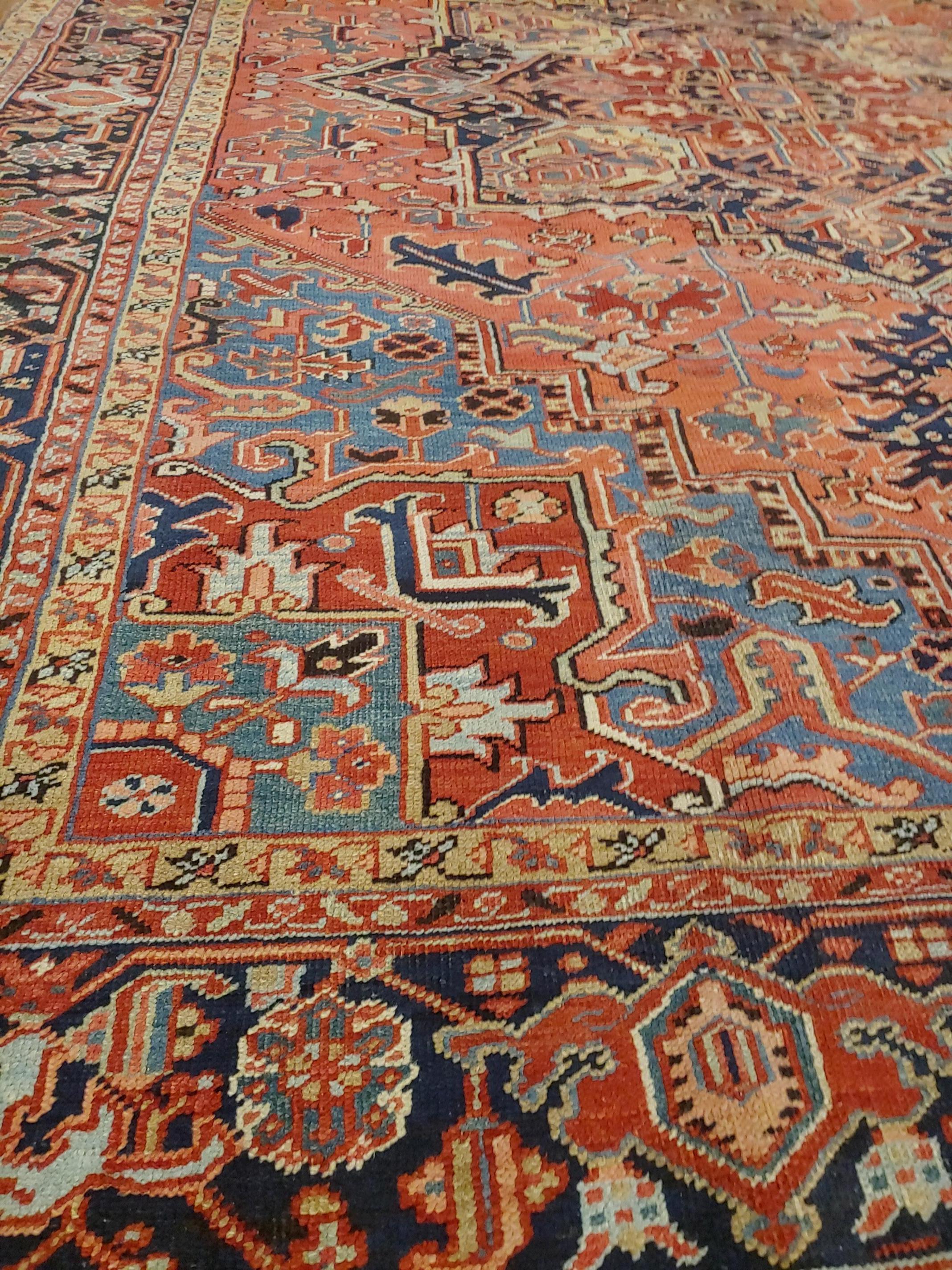 Heriz Serapi Antique Persian Heriz Rug, Coral Field Light Blue Corners, Wool, 1915 For Sale