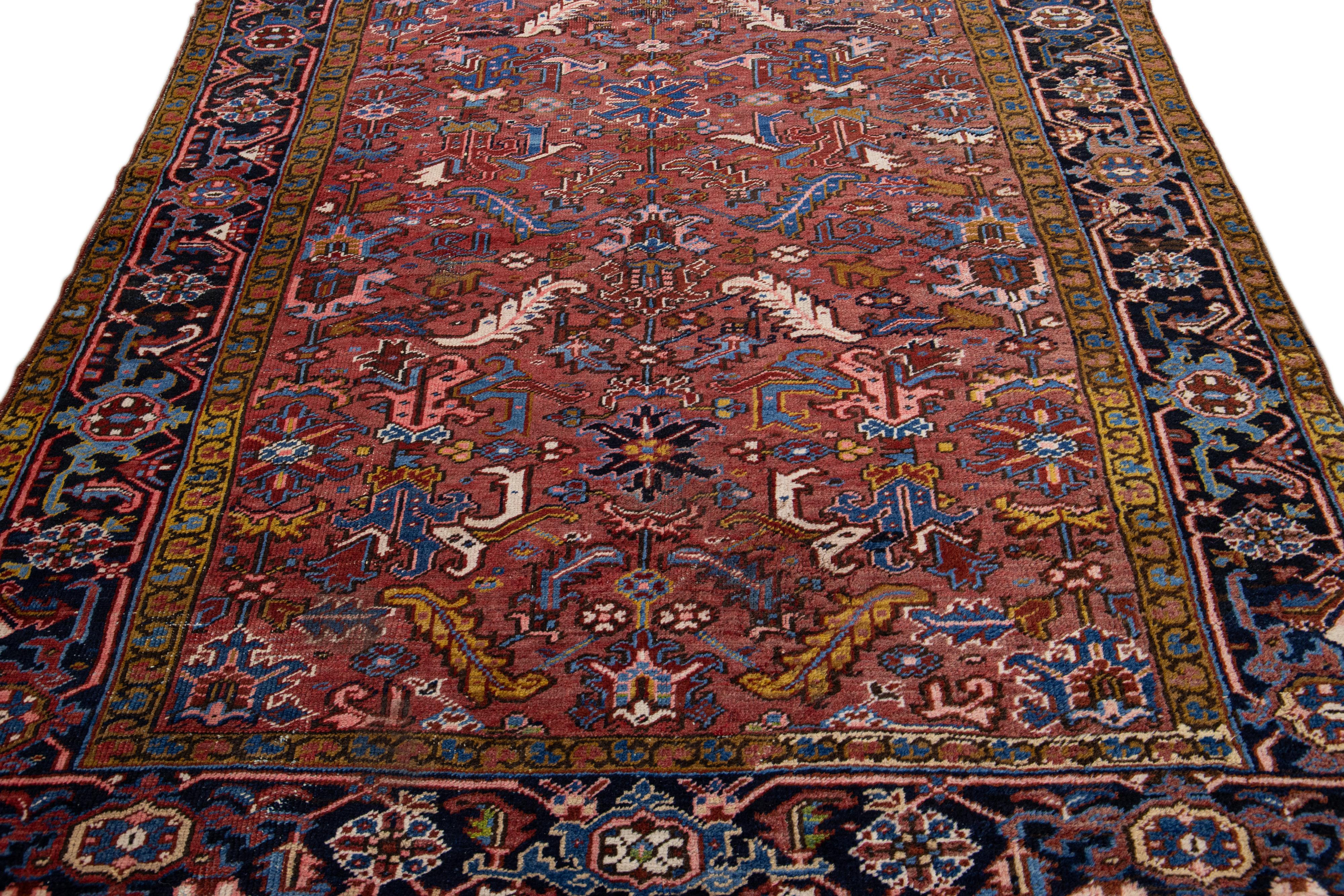 Heriz Serapi Antique Persian Heriz Handmade Allover Floral Burgundy Wool Rug For Sale