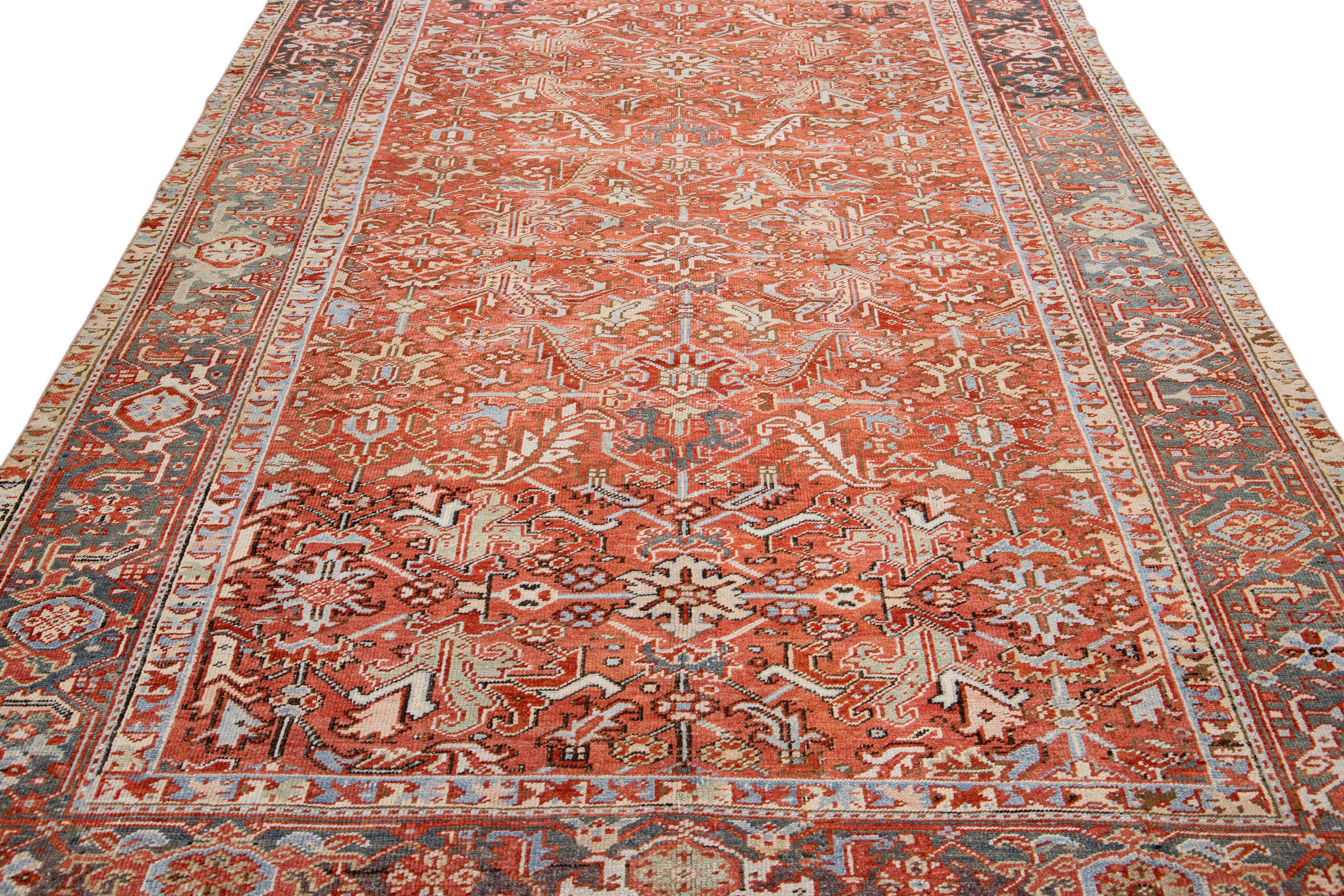 Heriz Serapi Antique Persian Heriz Handmade Allover Floral Orange Wool Rug For Sale