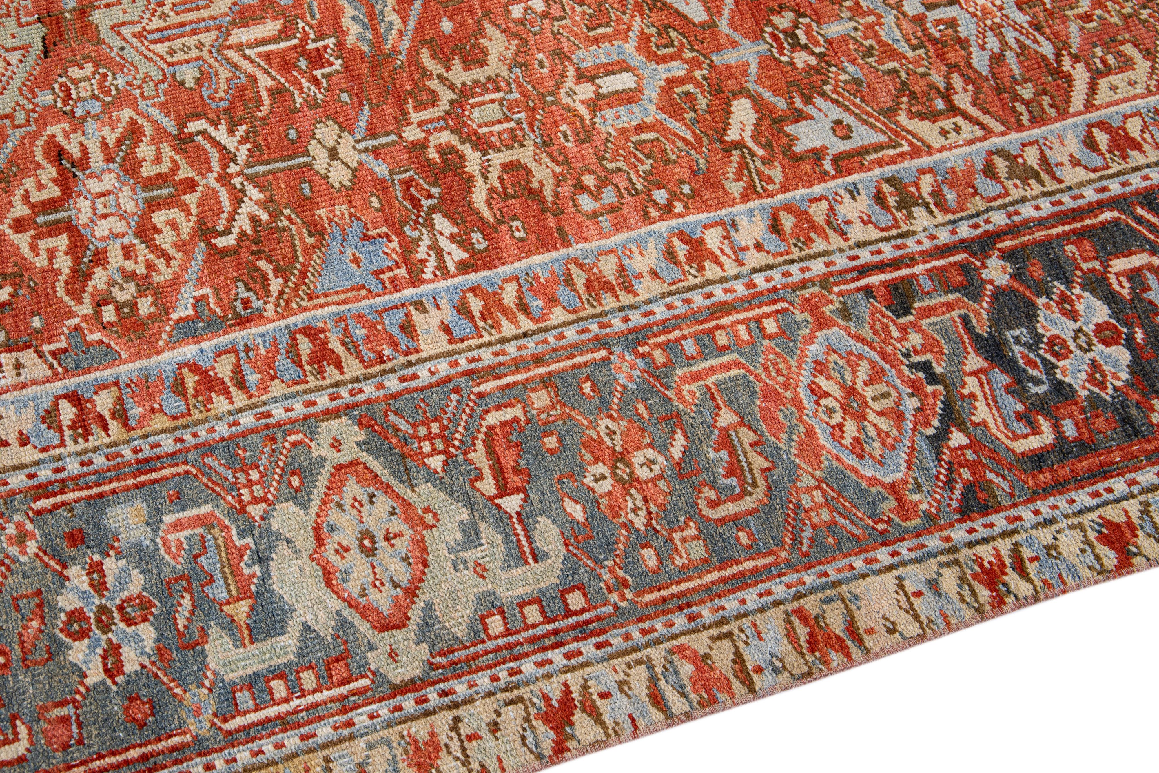 20th Century Antique Persian Heriz Handmade Allover Floral Orange Wool Rug For Sale