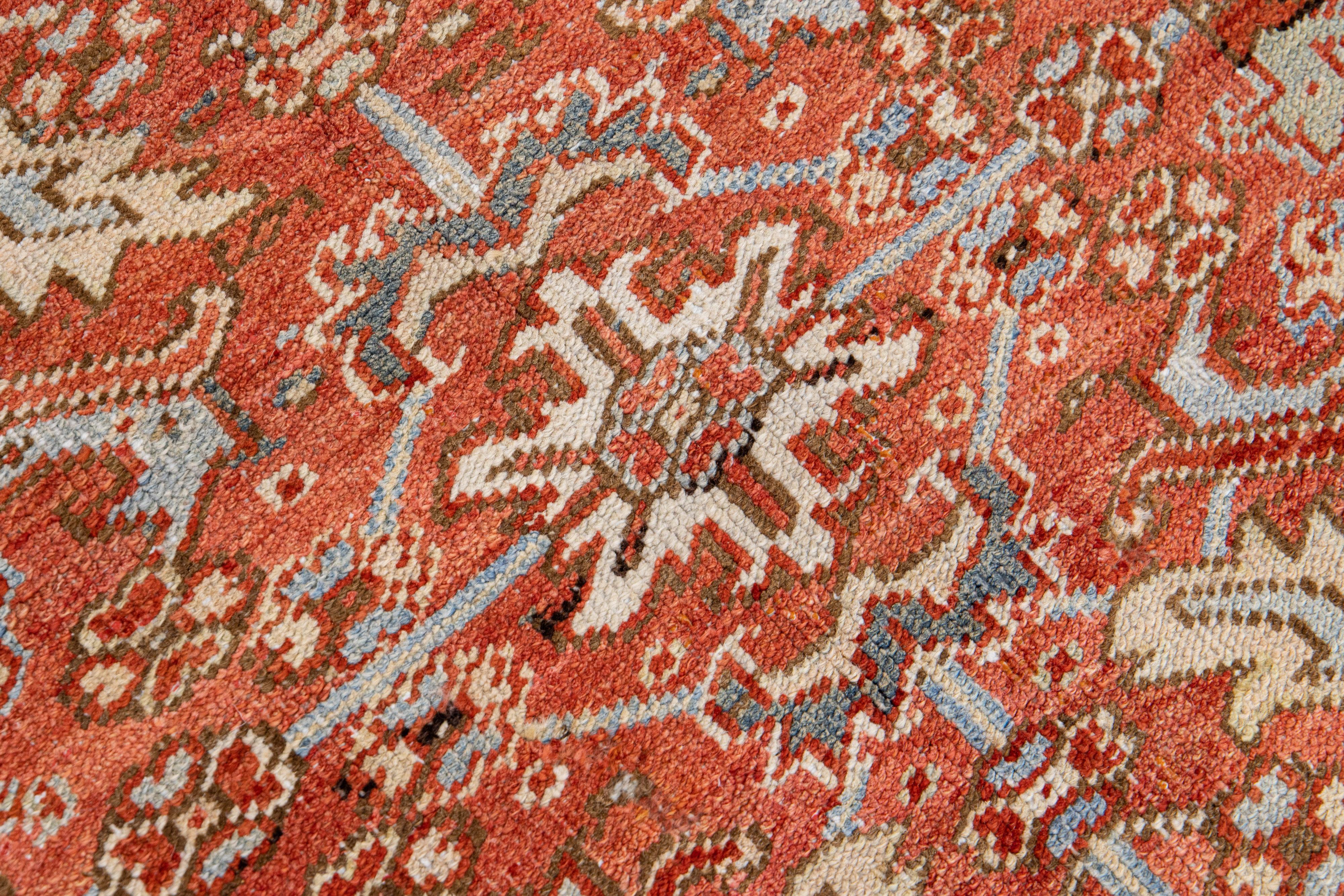 Antique Persian Heriz Handmade Allover Floral Orange Wool Rug For Sale 1