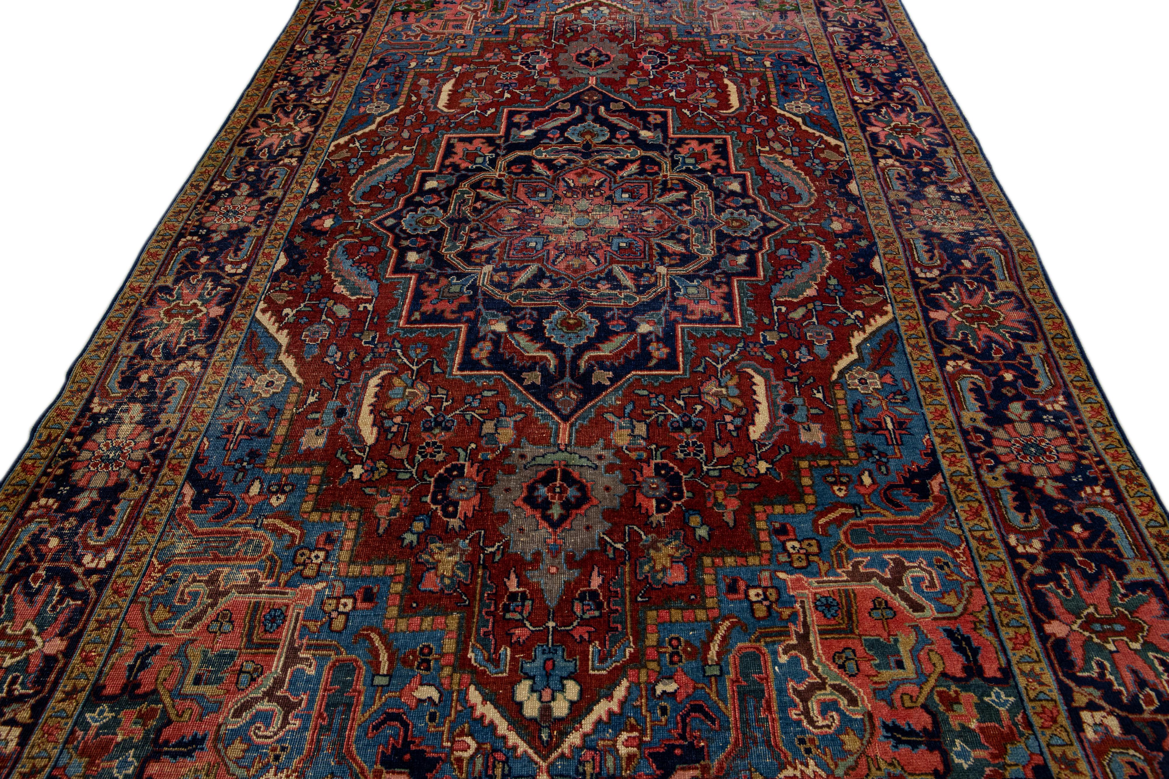 Heriz Serapi Antique Persian Heriz Handmade Allover Motif Red Wool Rug For Sale