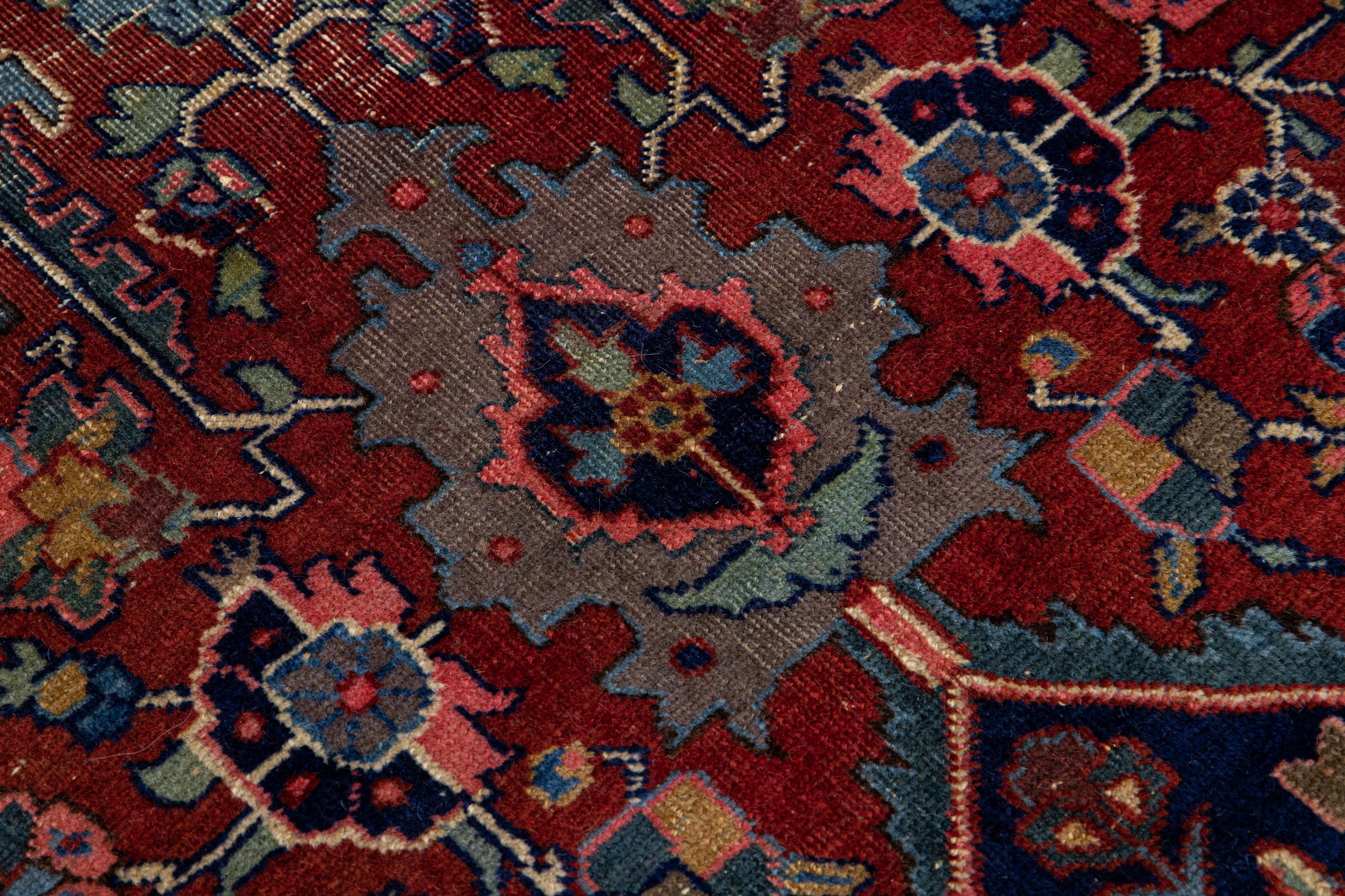 Antique Persian Heriz Handmade Allover Motif Red Wool Rug For Sale 1