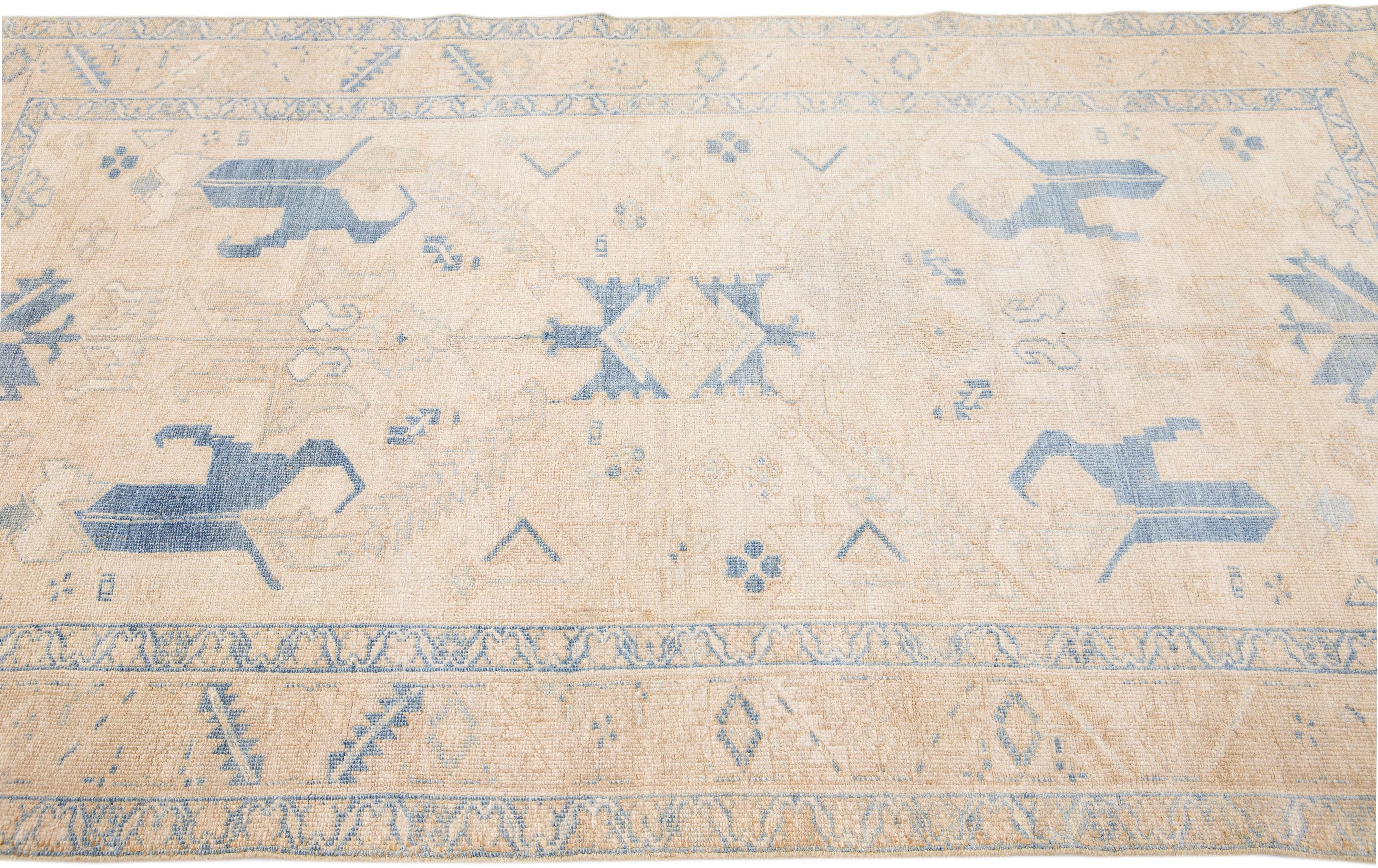 Early 20th Century Antique Persian Heriz Handmade Beige & Blue Wool Rug with Geometric Design For Sale