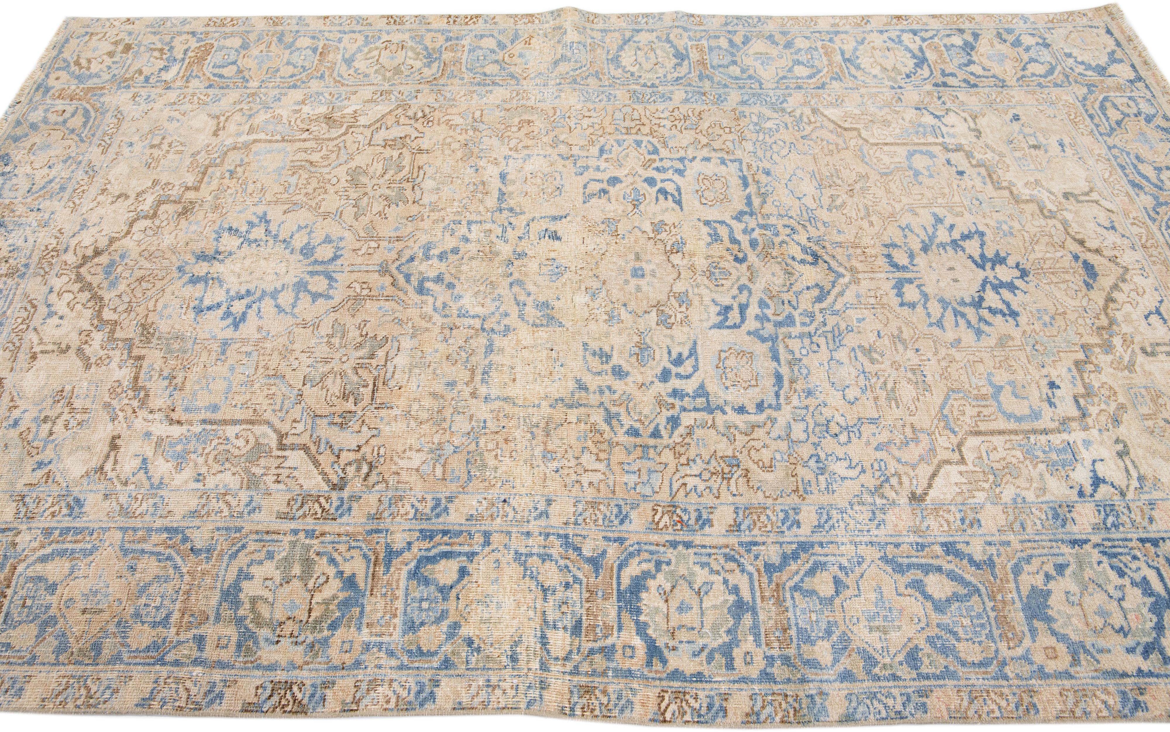 Early 20th Century Antique Persian Heriz Handmade Beige Wool Rug with Medallion Design For Sale