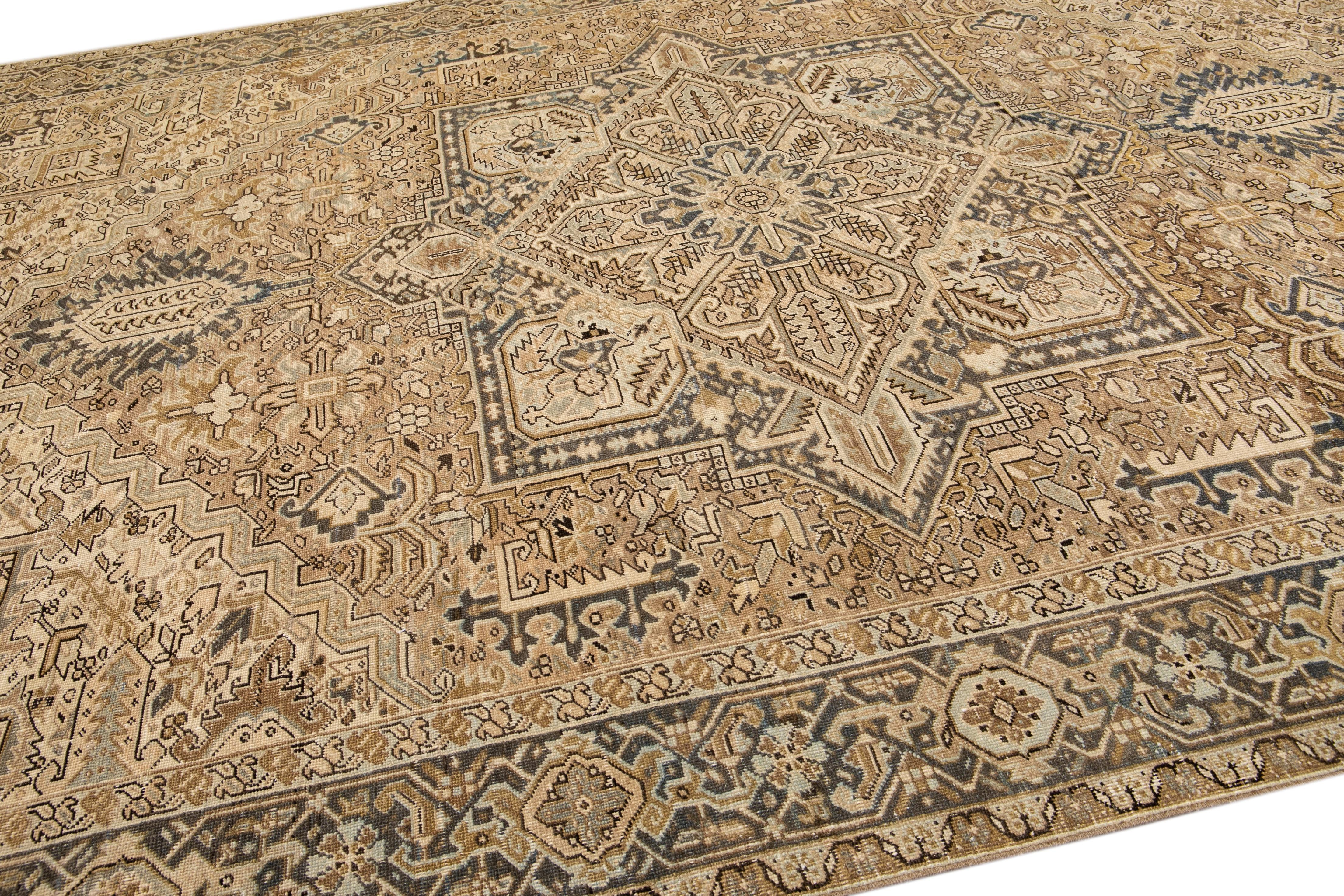 Antique Persian Heriz Handmade Geometric Beige And Blue Wool Rug In Good Condition For Sale In Norwalk, CT