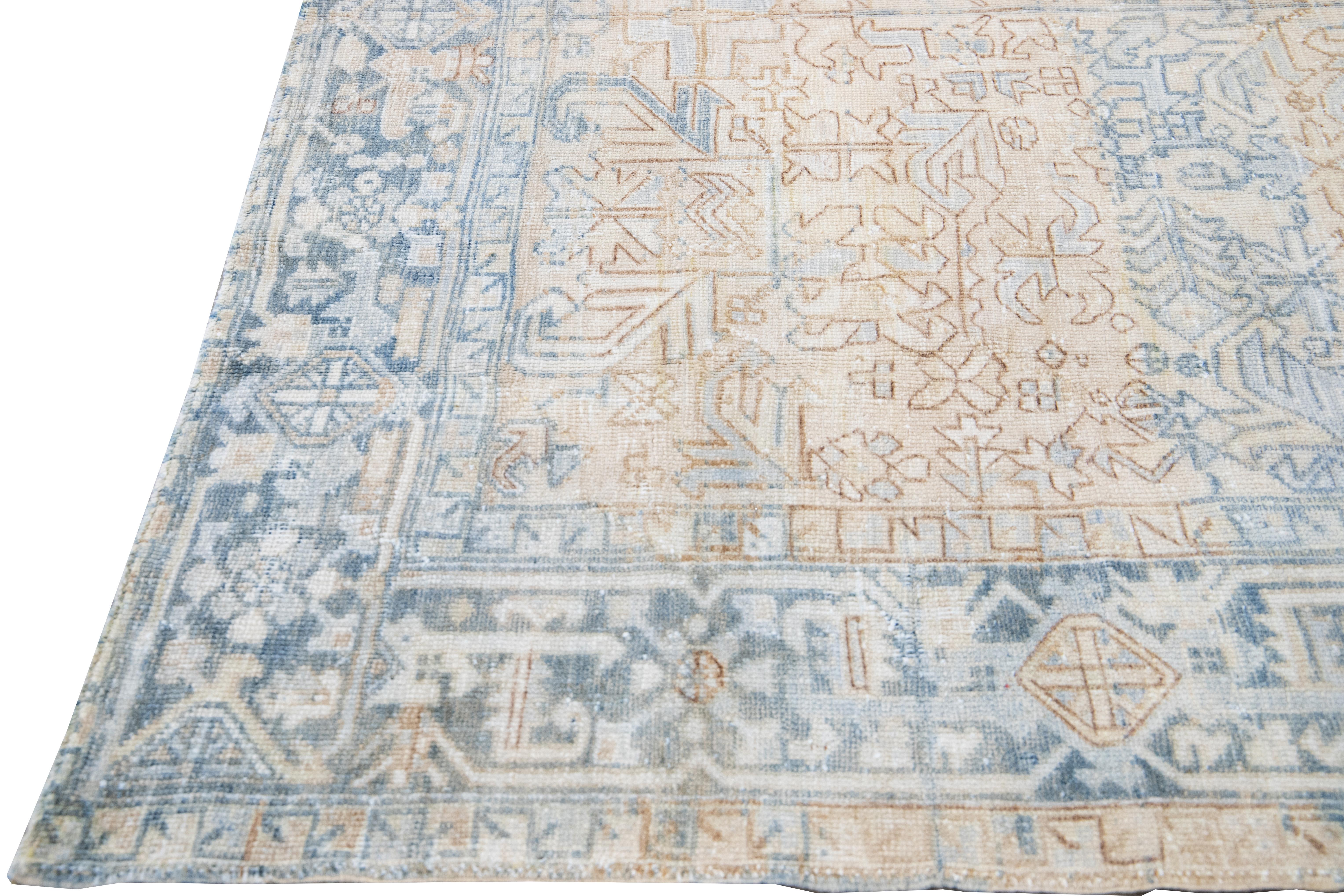 Early 20th Century Antique Persian Heriz Handmade Geometric Beige and Blue Wool Rug For Sale