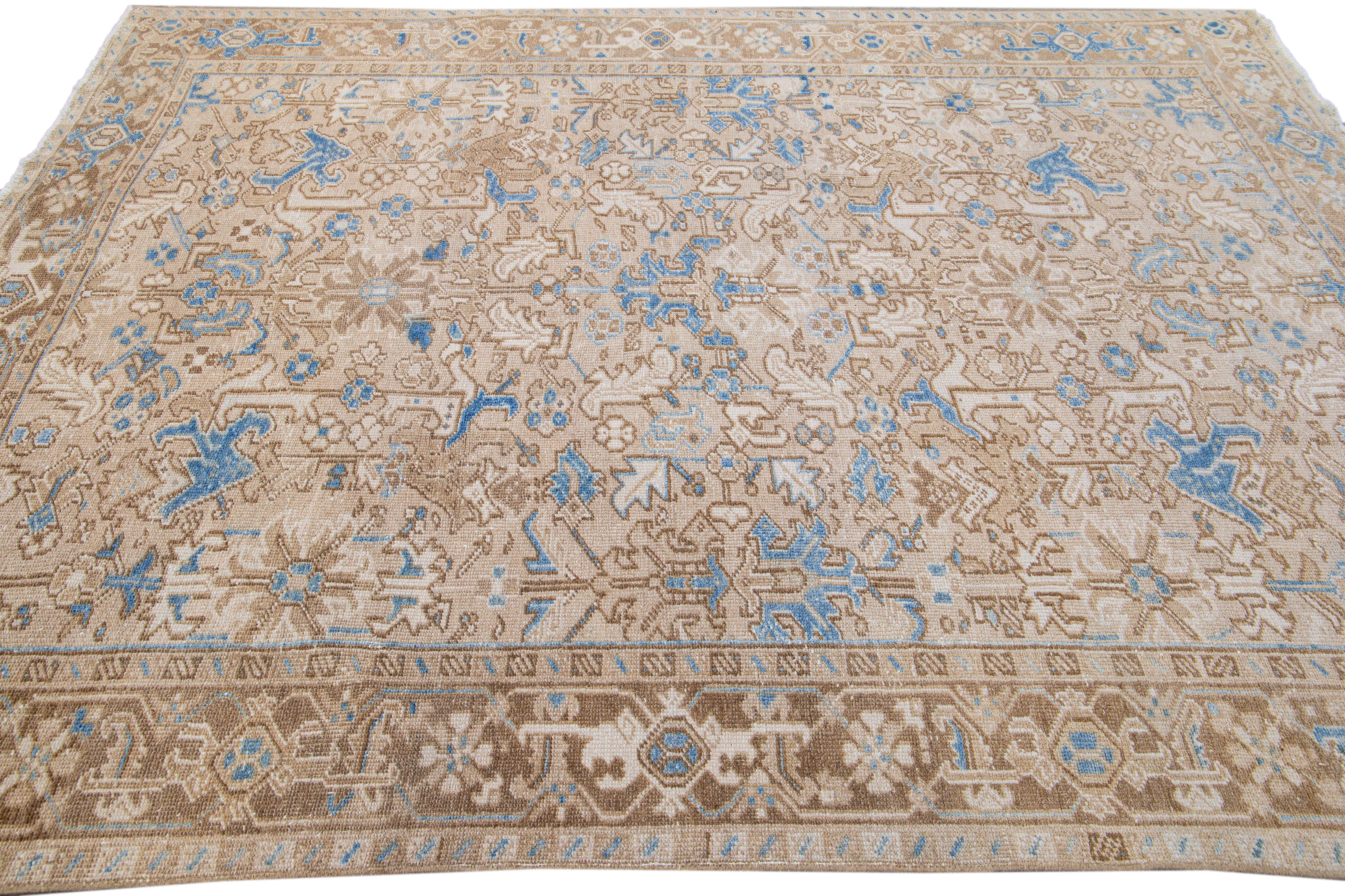 Early 20th Century Antique Persian Heriz Handmade Geometric Floral Beige and Blue Wool Rug For Sale