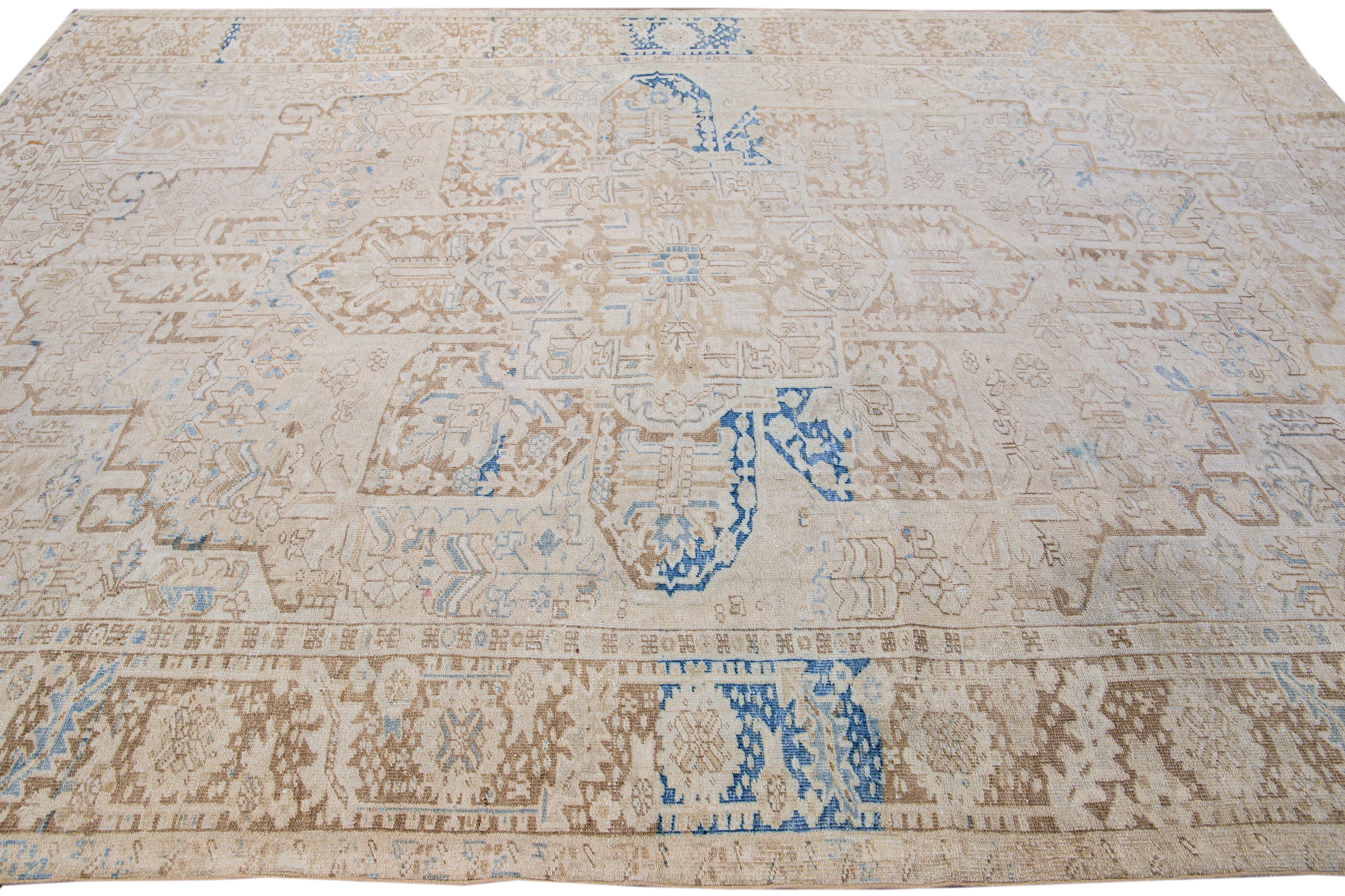 Early 20th Century Antique Persian Heriz Handmade Medallion Designed Beige and Blue Wool Rug For Sale