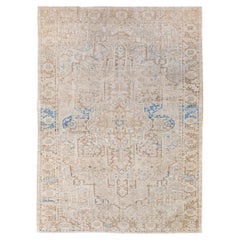 Antigua alfombra persa Heriz de lana beige y azul con diseño de medallón hecho a mano