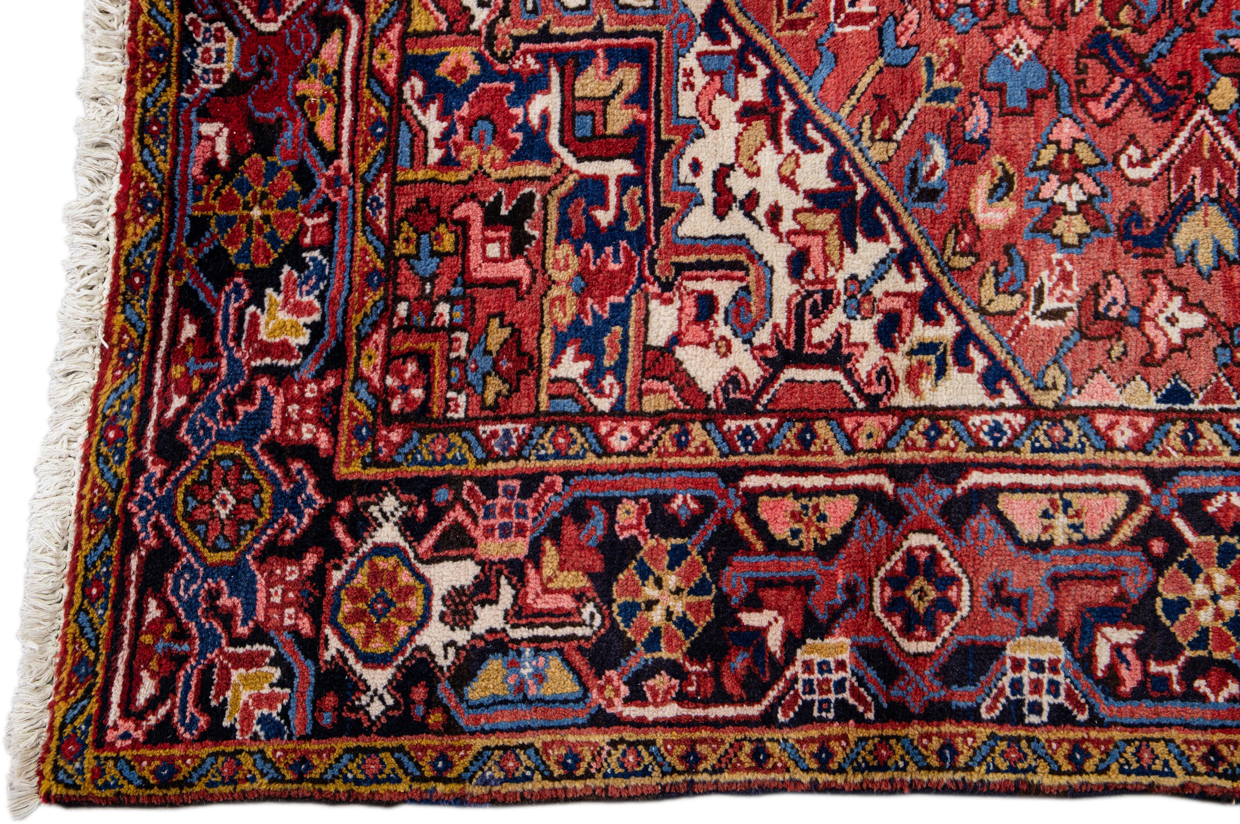Hand-Knotted Antique Persian Heriz Handmade Medallion Designed Red Wool Rug For Sale
