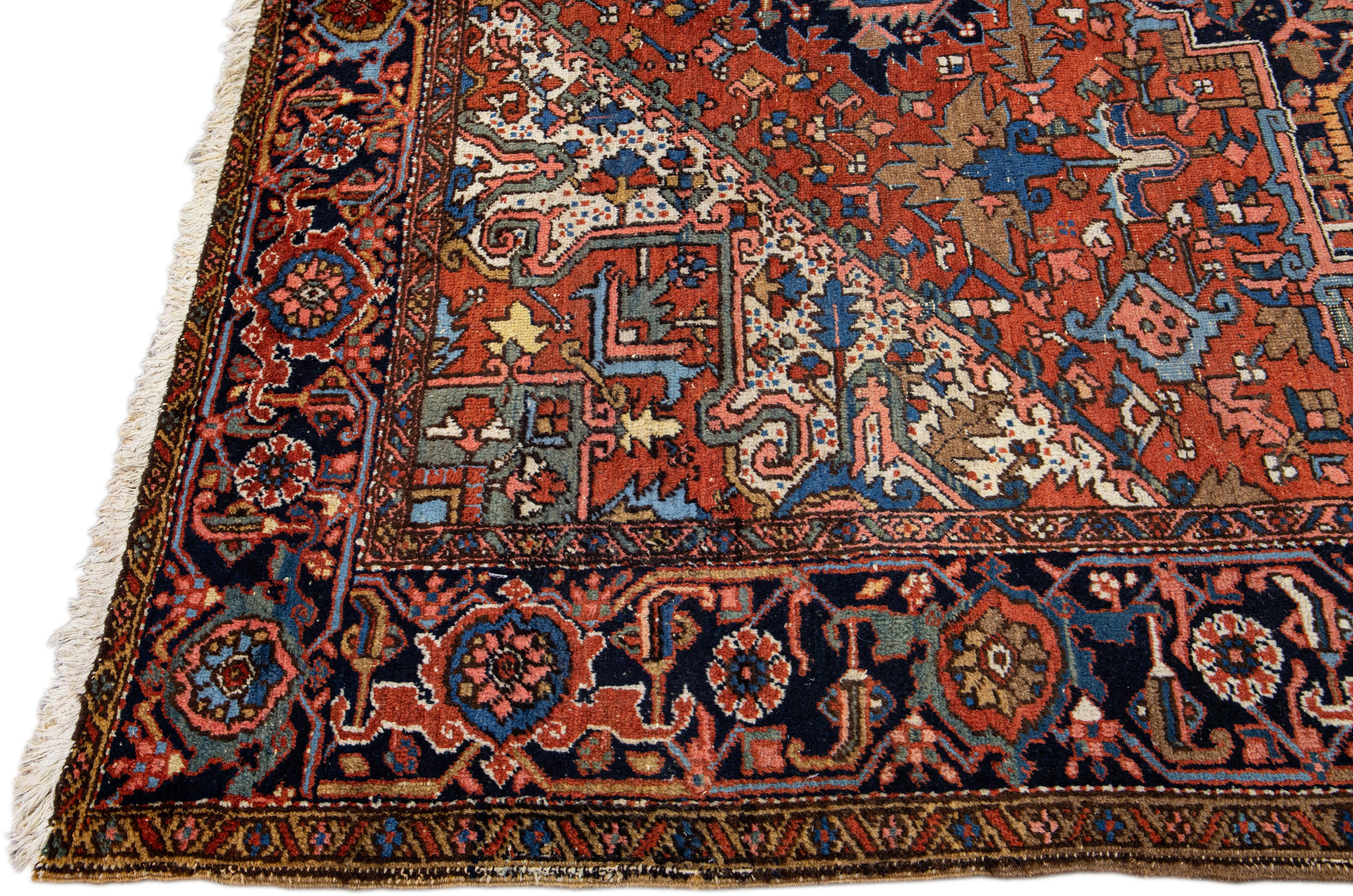 Hand-Knotted Antique Persian Heriz Handmade Medallion Designed Rust Wool Rug  For Sale