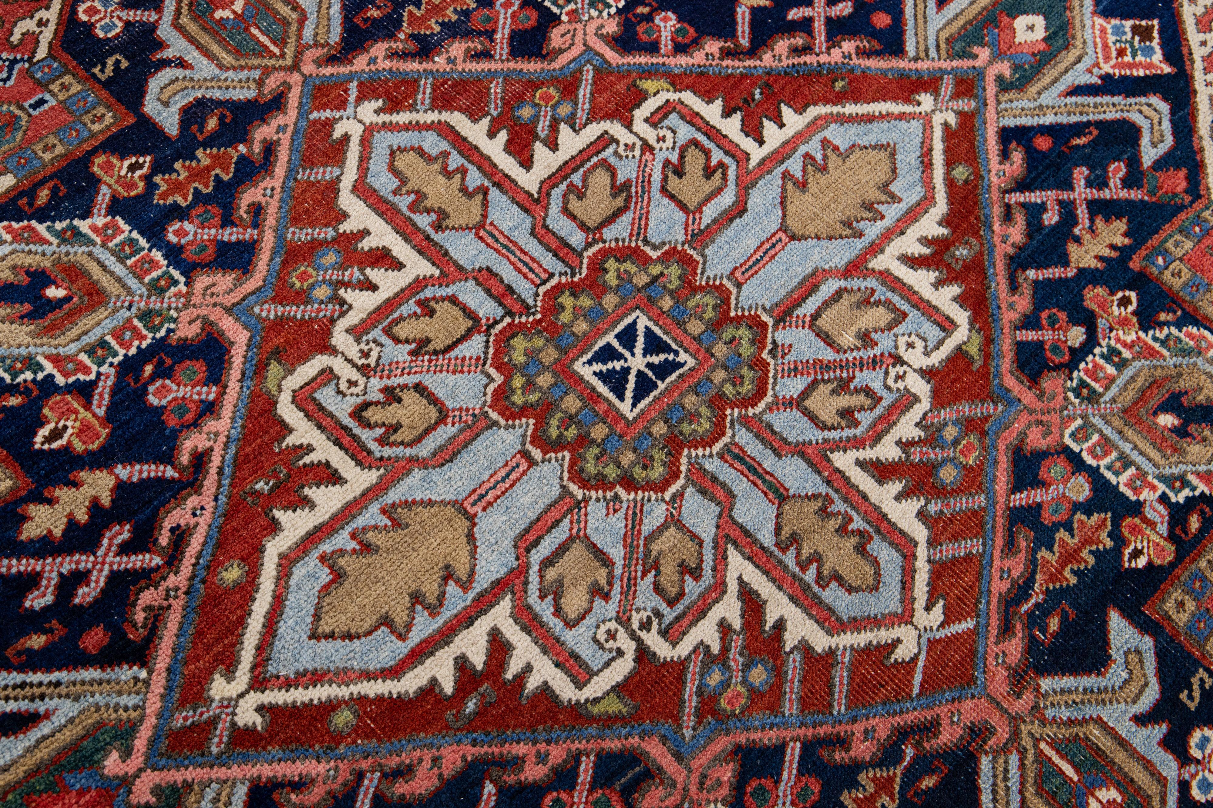 Antique Persian Heriz Handmade Medallion Motif Wool Rug For Sale 1