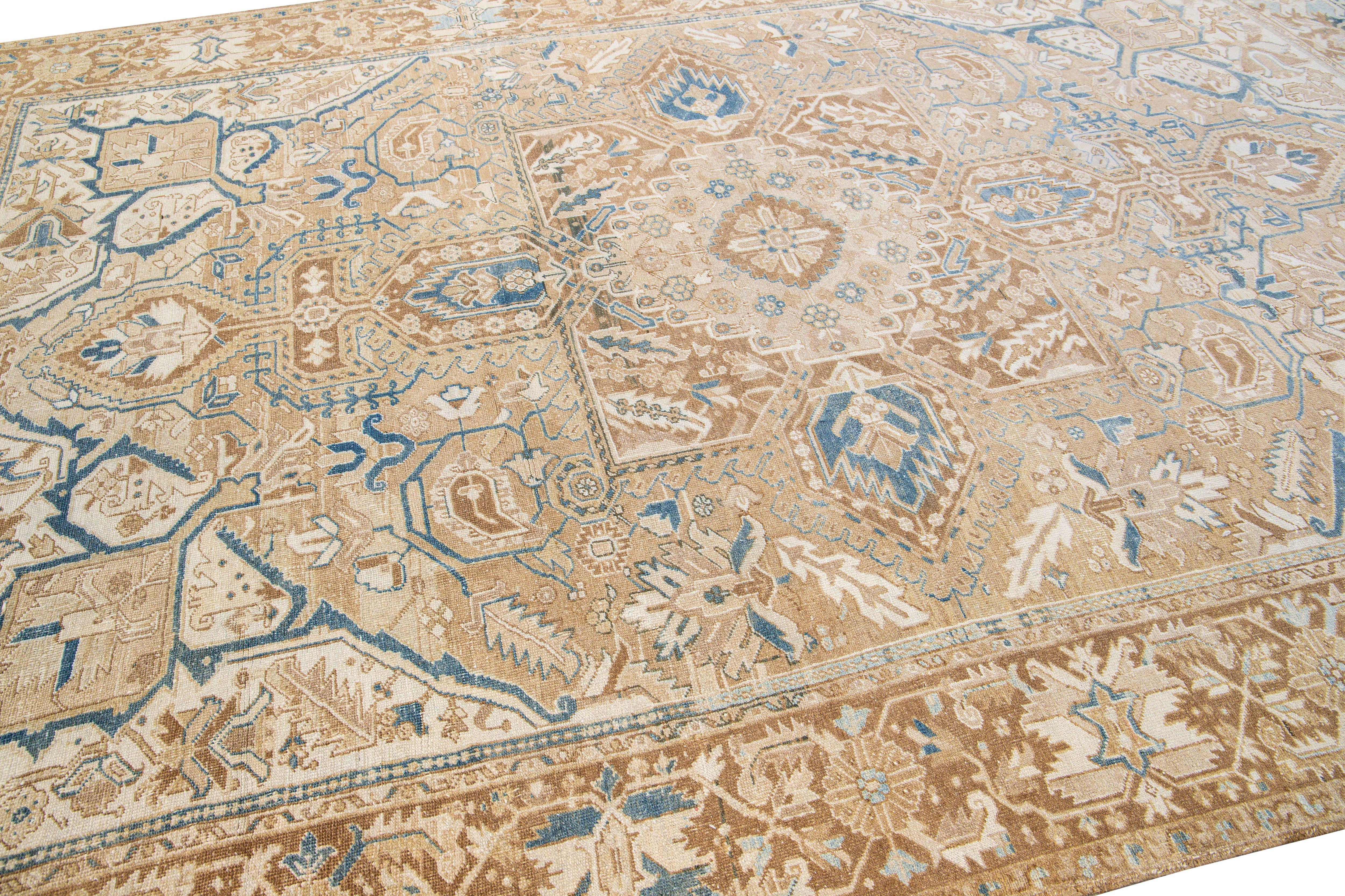 Hand-Knotted Antique Persian Heriz Handmade Medallion Tan and Blue Wool Rug For Sale