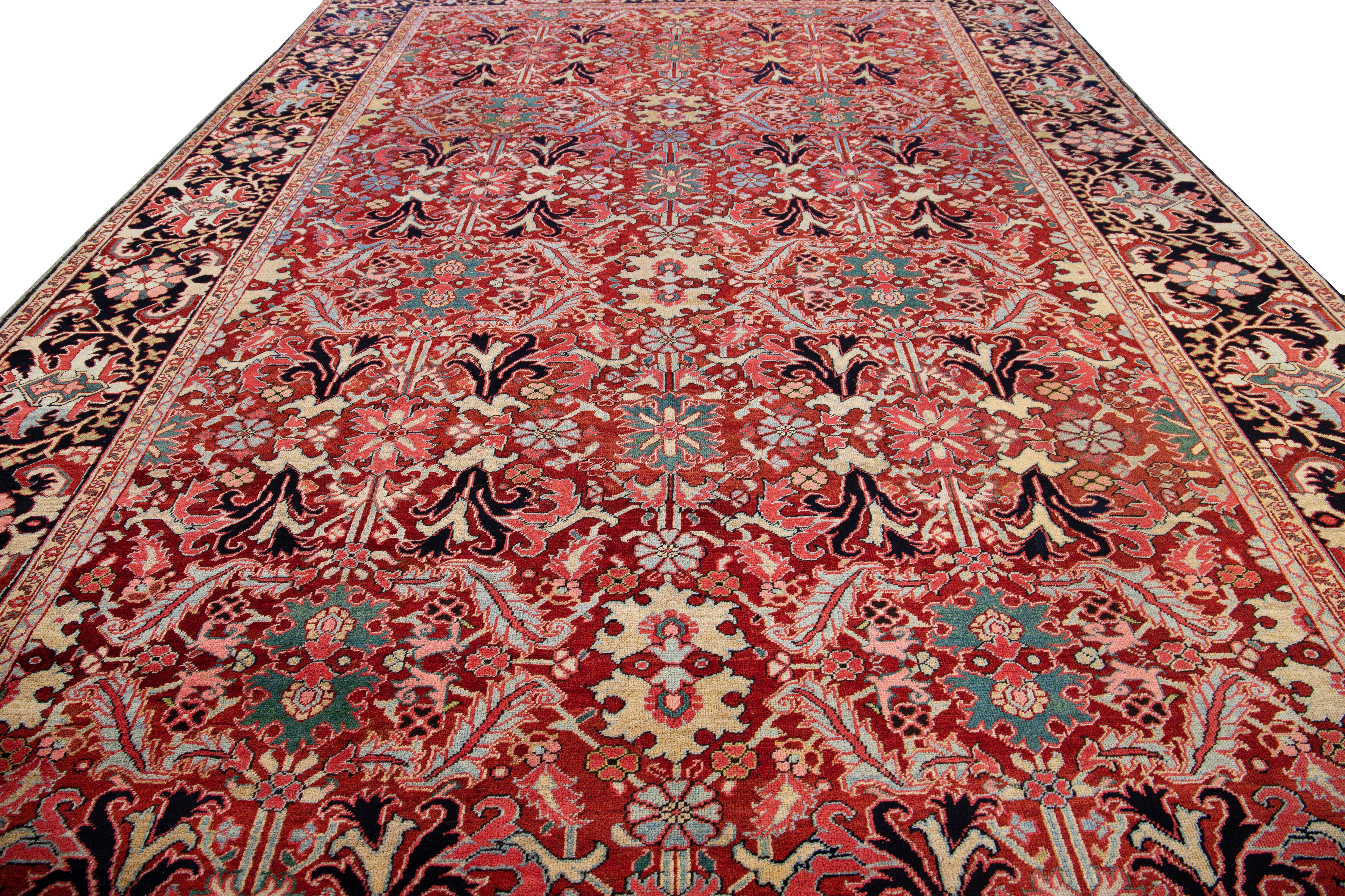Heriz Serapi Antique Persian Heriz Handmade Multicolor Floral Designed Red Oversize Wool Rug For Sale