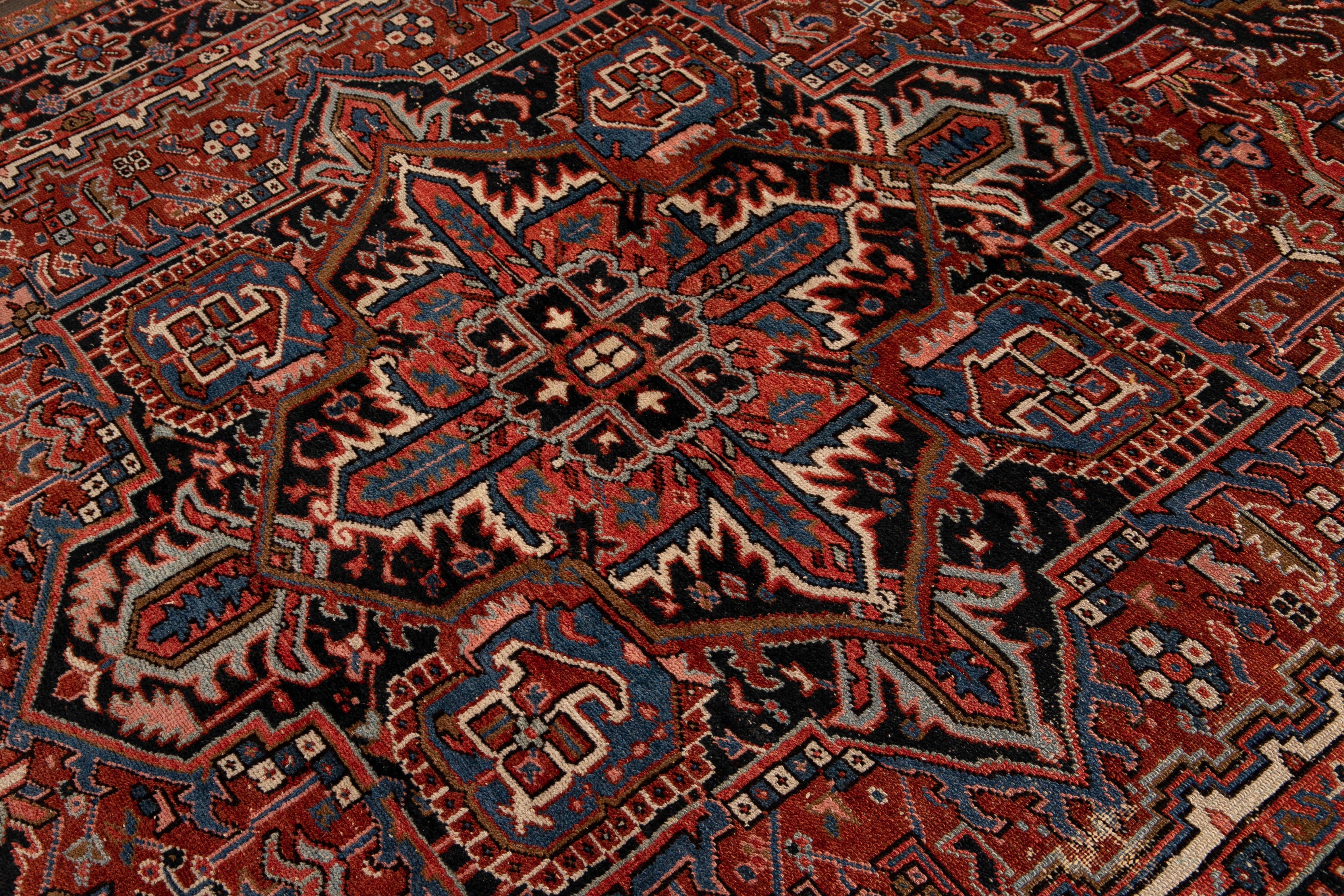 Antique Persian Heriz Handmade Multicolor Medallion Wool Rug For Sale 2