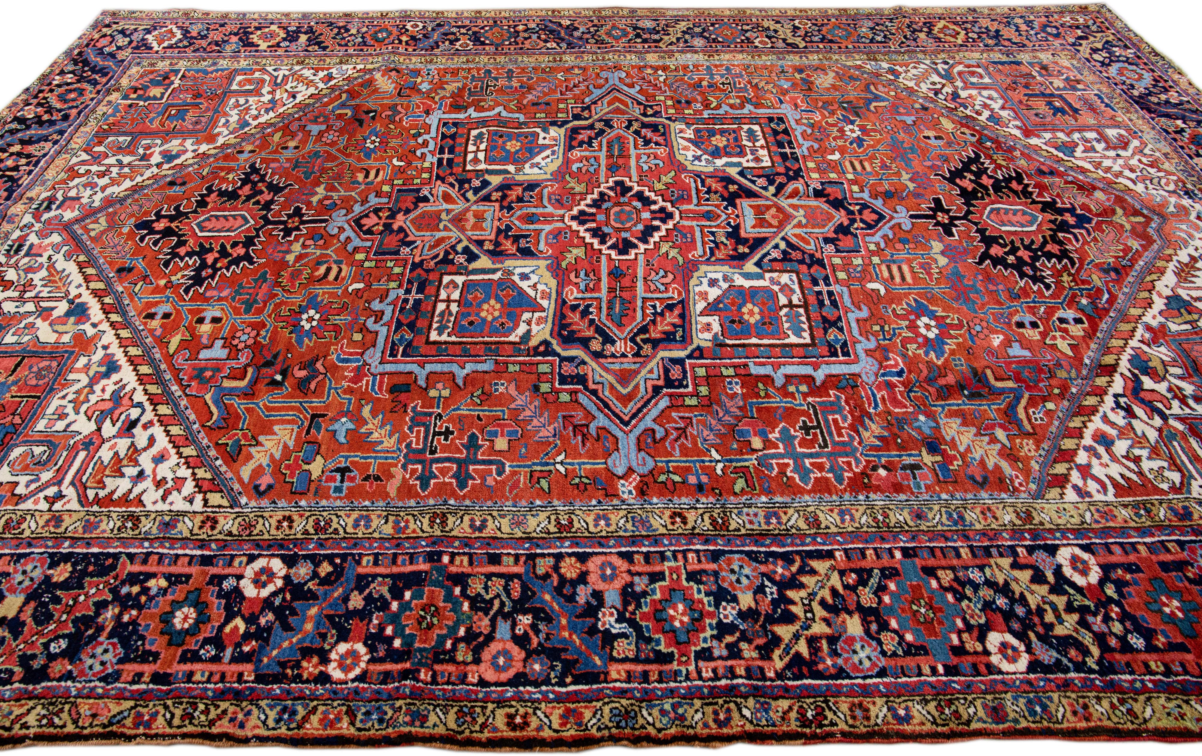 Hand-Knotted Antique Persian Heriz Handmade Orange-Rust Wool Rug with Medallion Design For Sale