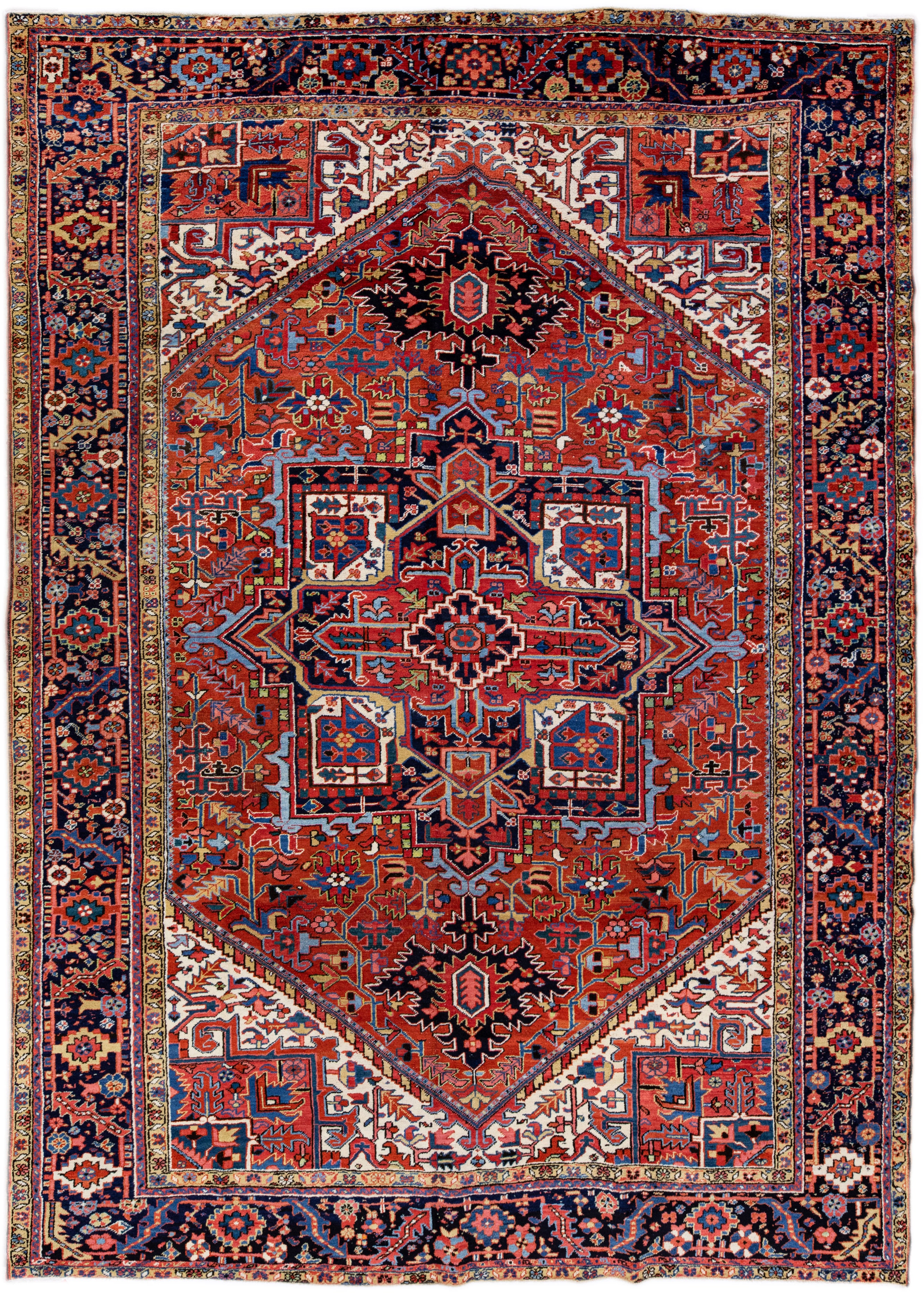 Antique Persian Heriz Handmade Orange-Rust Wool Rug with Medallion Design For Sale
