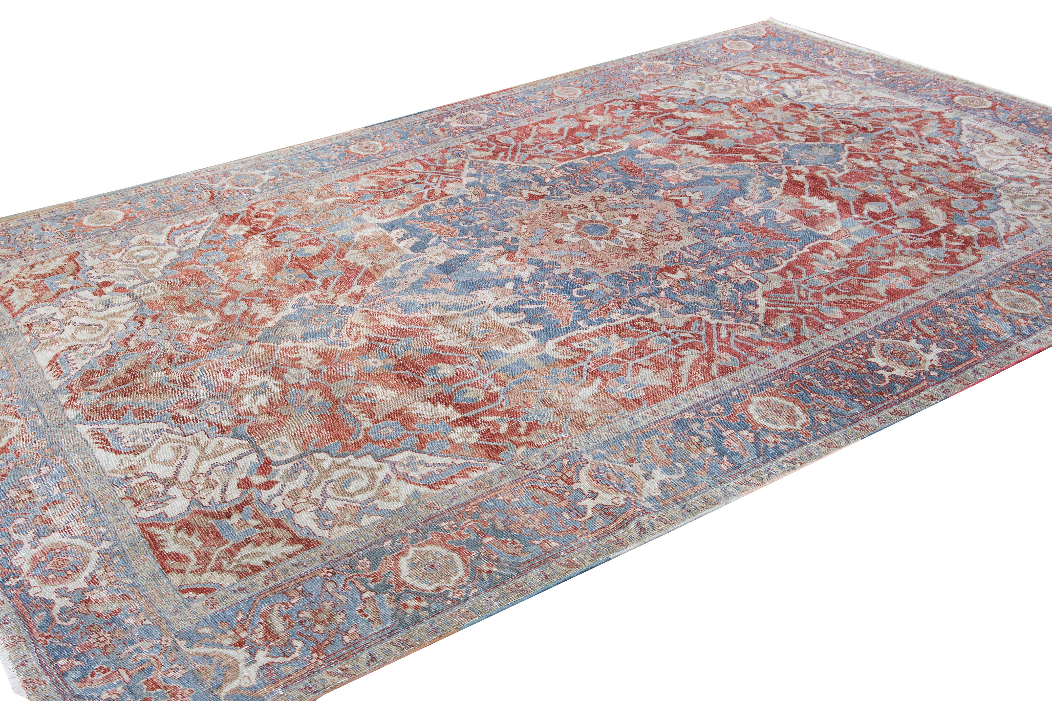 Antique Persian Heriz Handmade Red and Blue Medallion Floral Wool Rug In Distressed Condition For Sale In Norwalk, CT