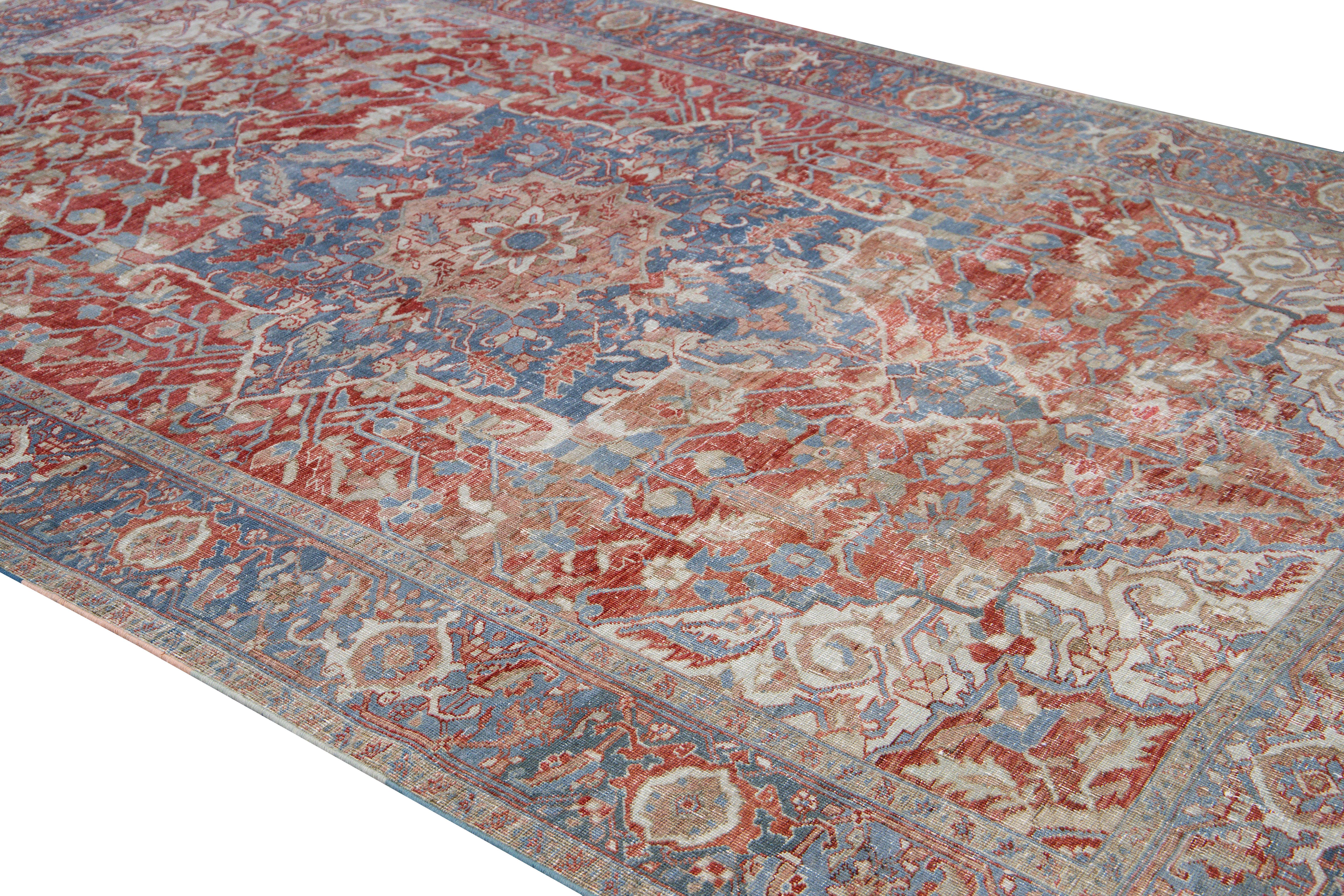 Antique Persian Heriz Handmade Red and Blue Medallion Floral Wool Rug For Sale 1