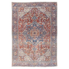 Antique Persian Heriz Handmade Red and Blue Medallion Floral Wool Rug