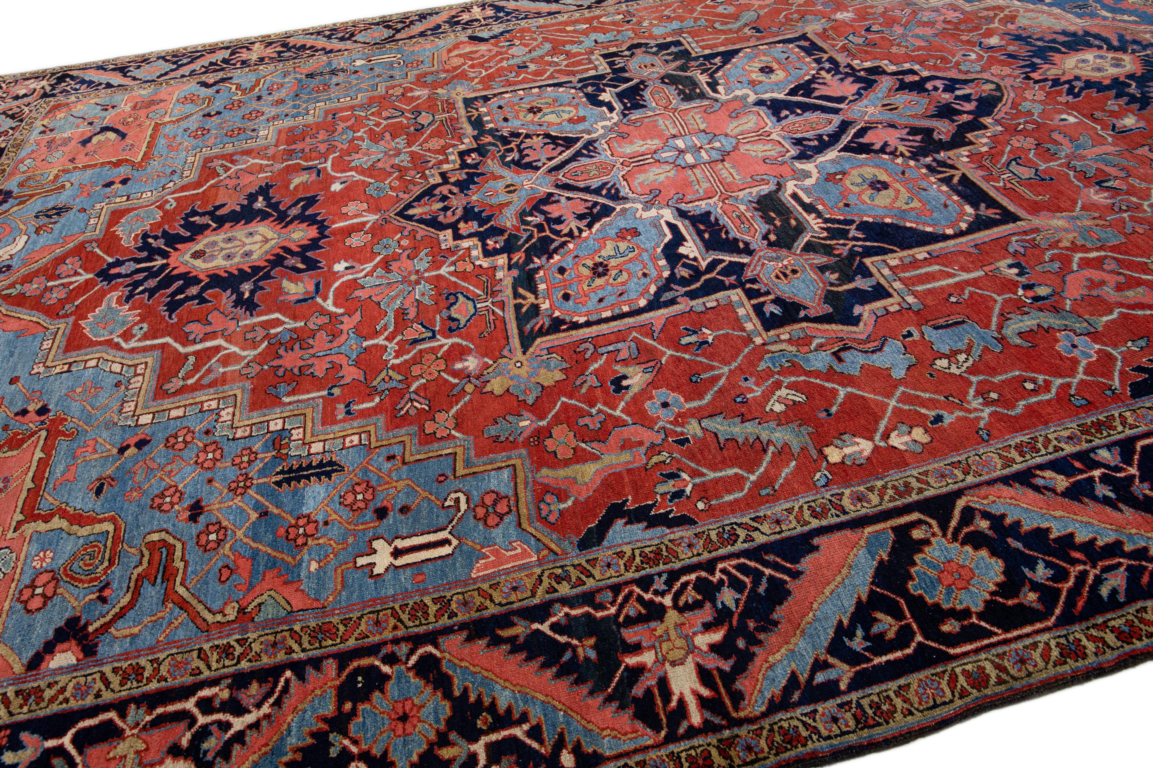 Hand-Knotted Antique Persian Heriz Handmade Red & Blue Wool Rug with Medallion Design For Sale