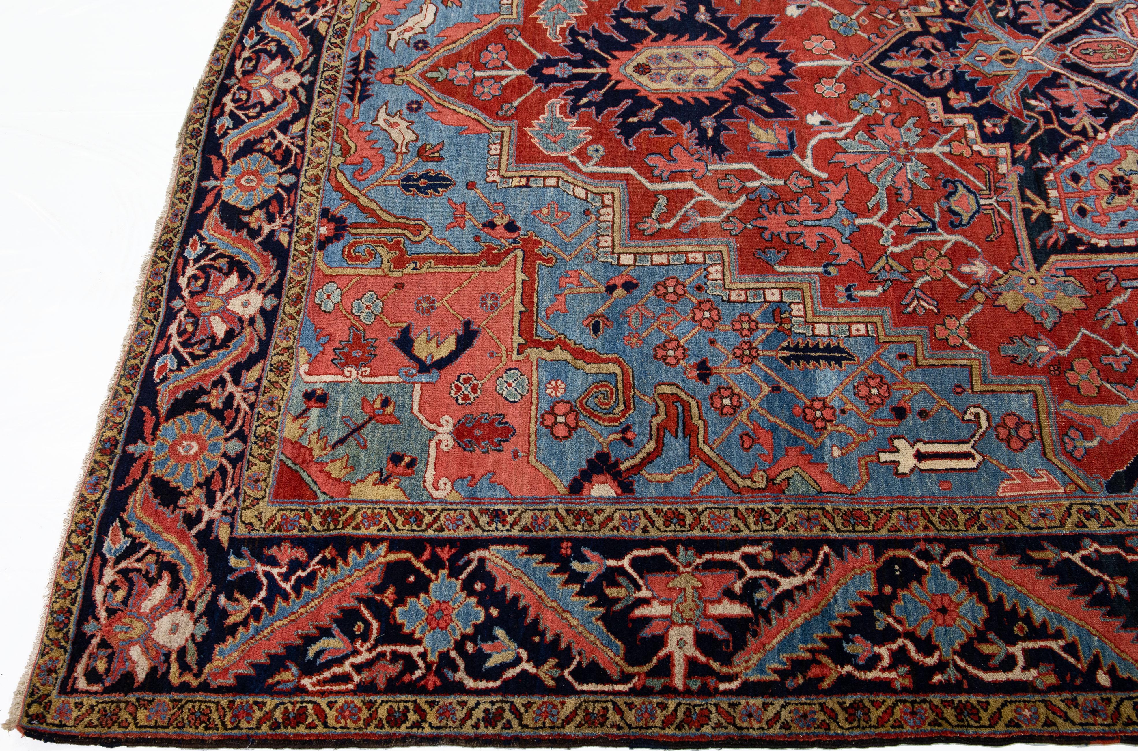 Antique Persian Heriz Handmade Red & Blue Wool Rug with Medallion Design In Good Condition For Sale In Norwalk, CT
